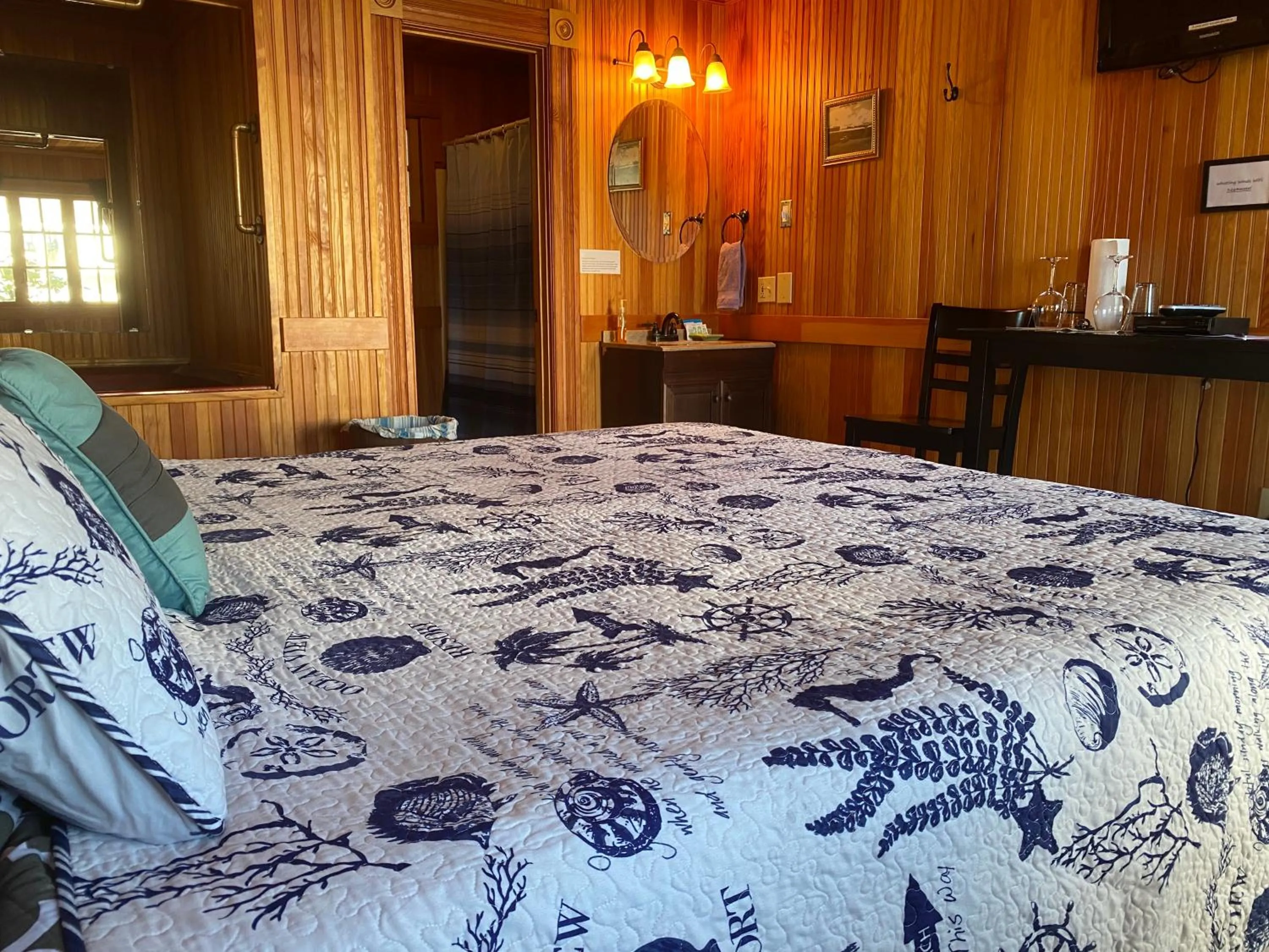 Bed in Whistling Winds Motel