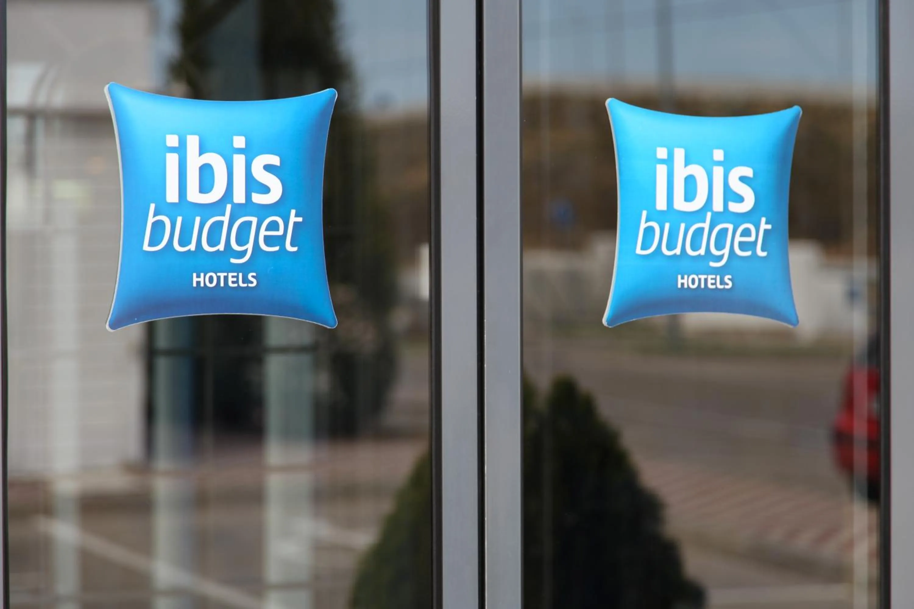Property logo or sign in Ibis Budget Madrid Alcalá de Henares La Dehesa