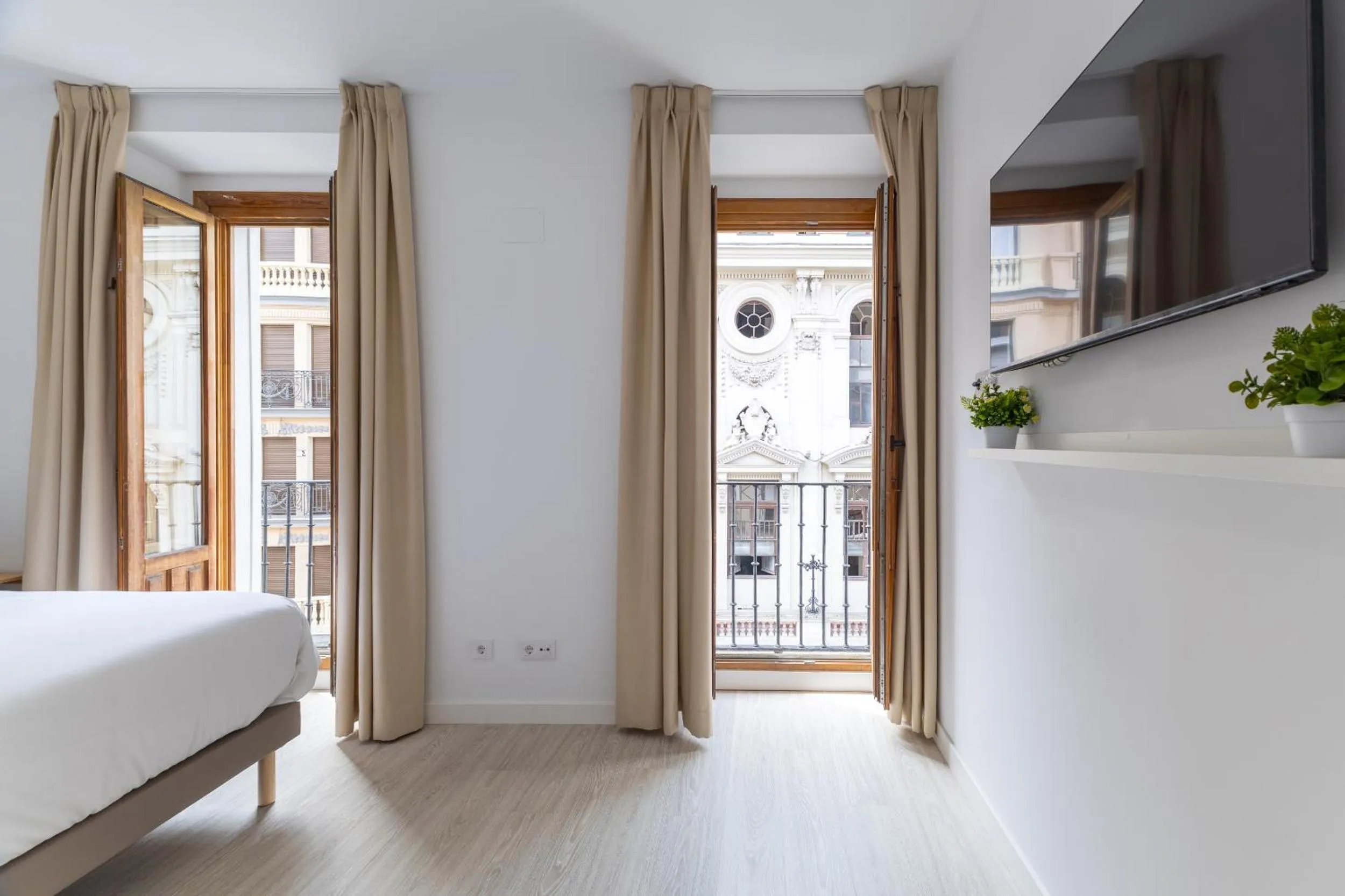 Bed in Apartamentos Madrid