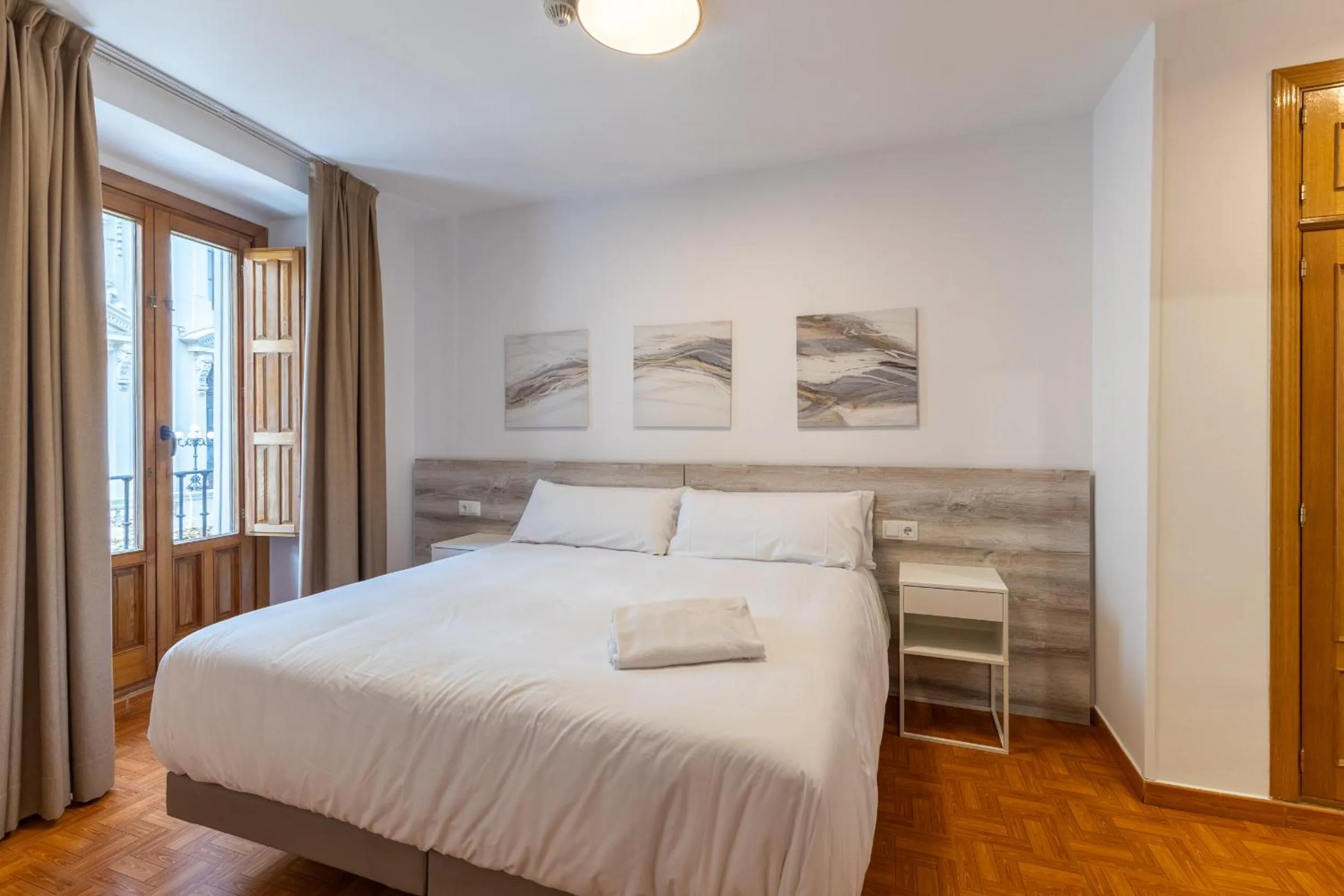 Bed in Apartamentos Madrid