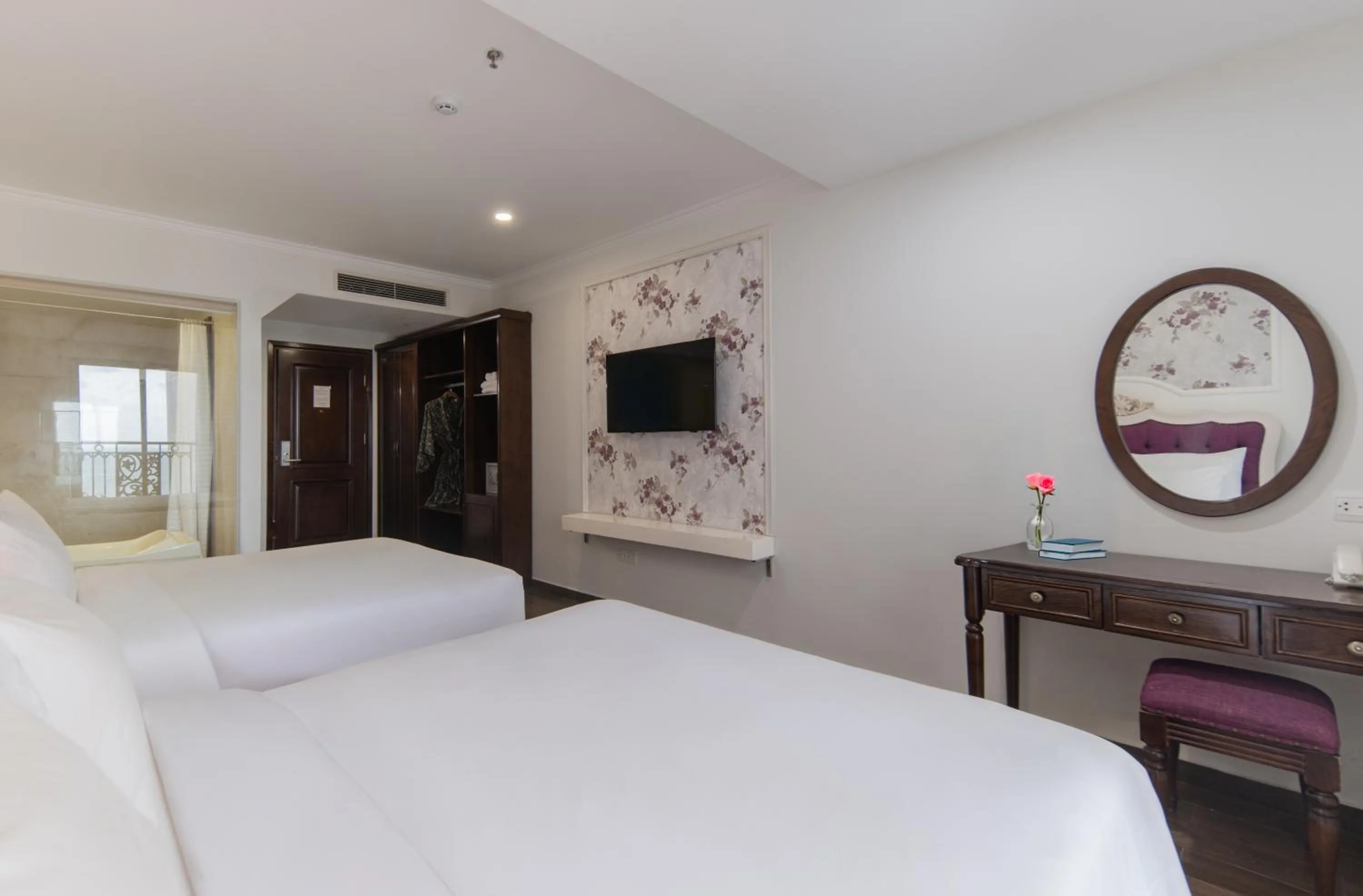Bed in Bonjour Nha Trang Hotel