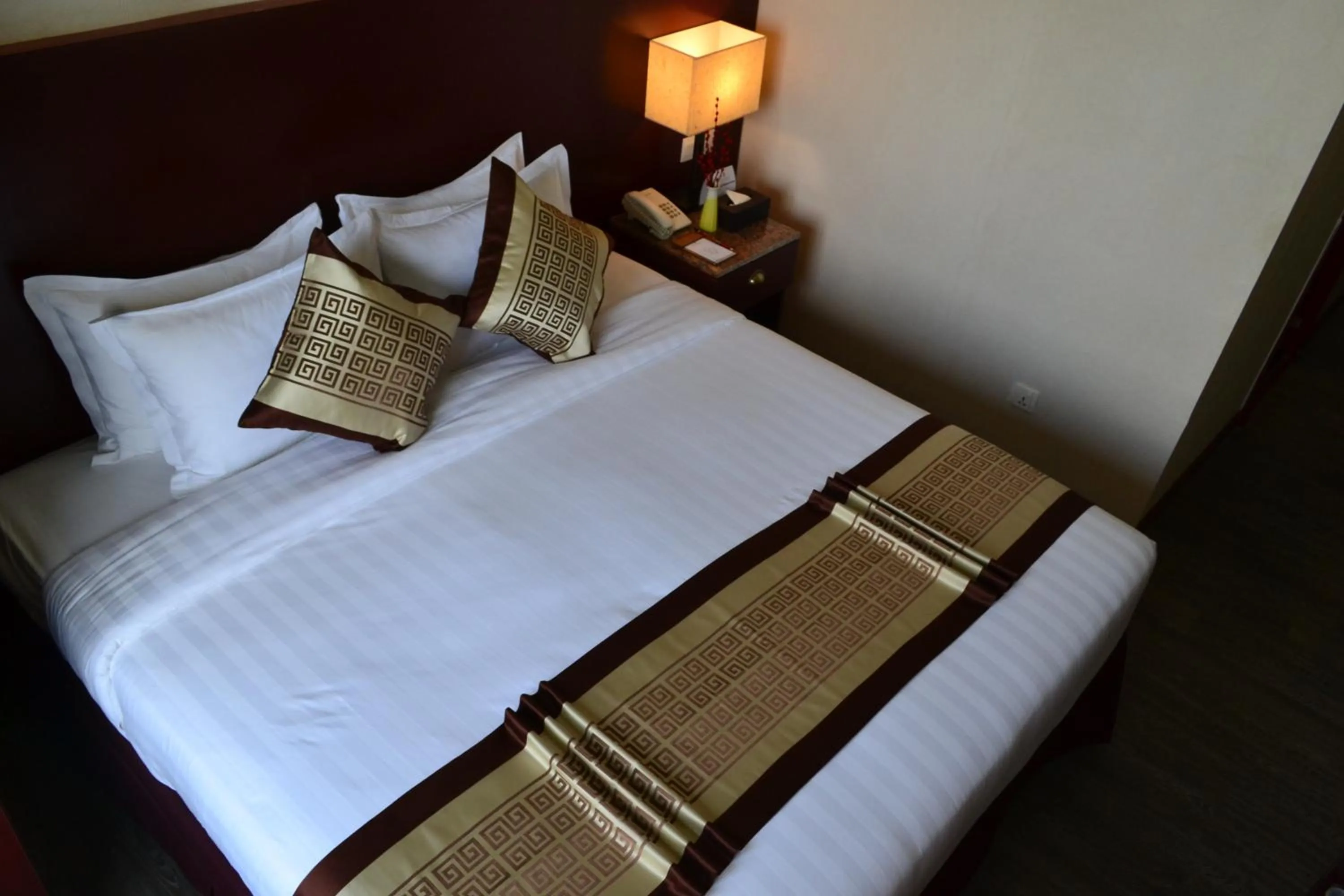 Bed in Hotel Broadway Yangon