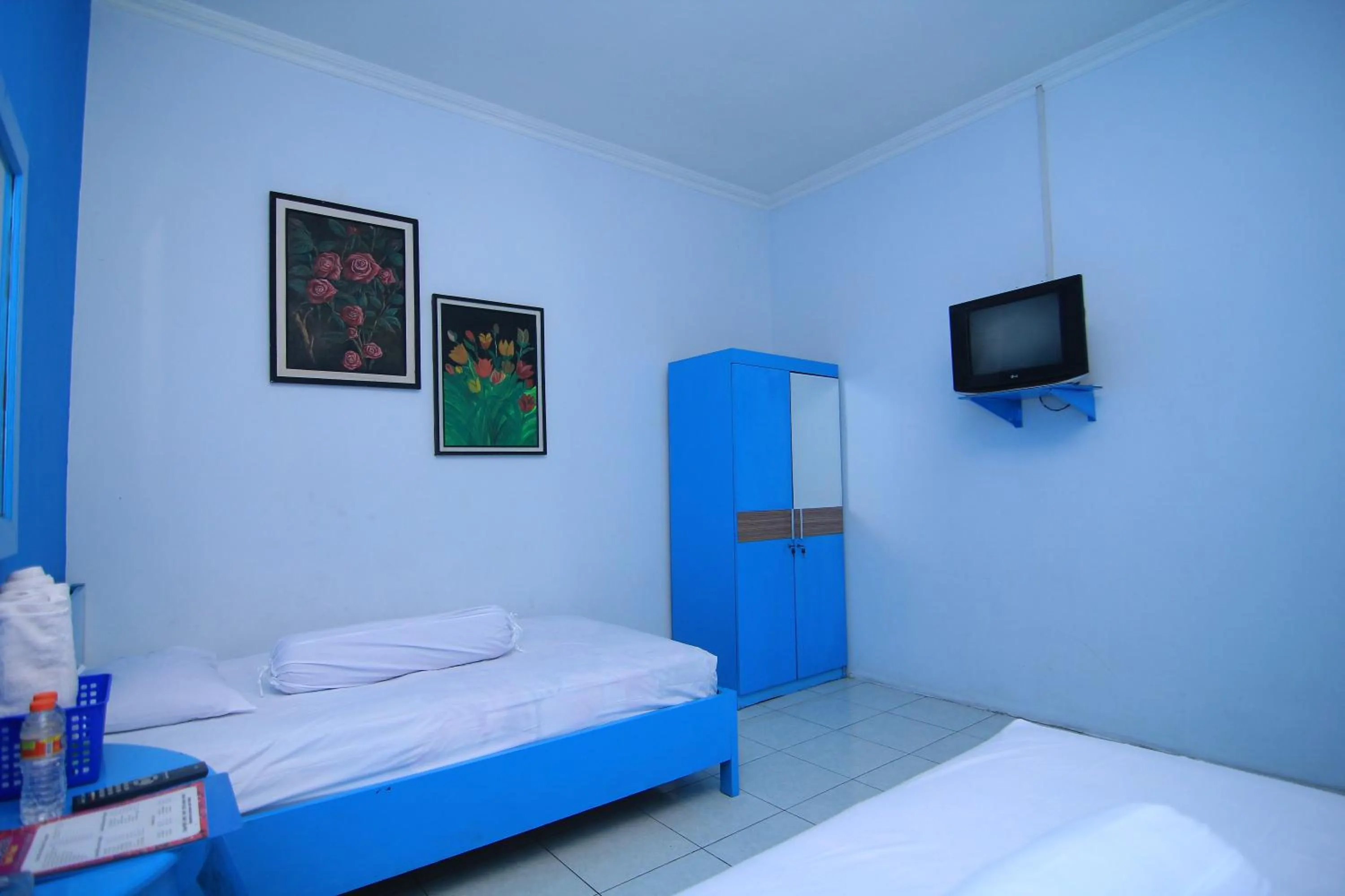 Bed in Hotel Boegenviel Syariah