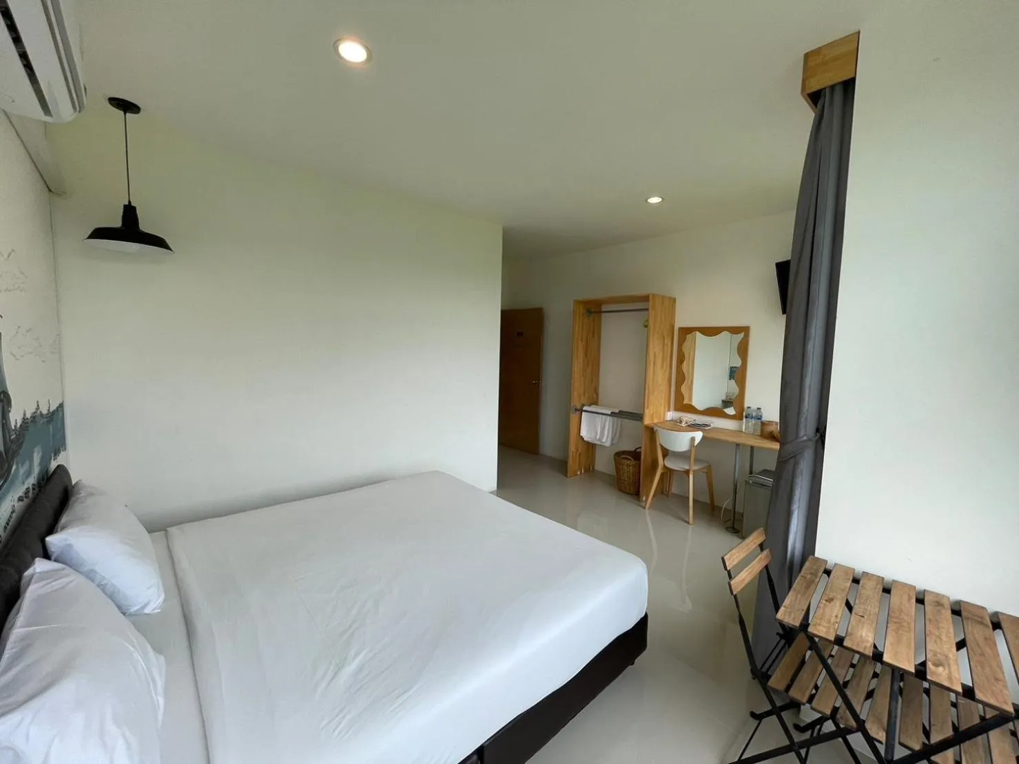 Bed in Dwell Phuket Airport Hotel at Naiyang