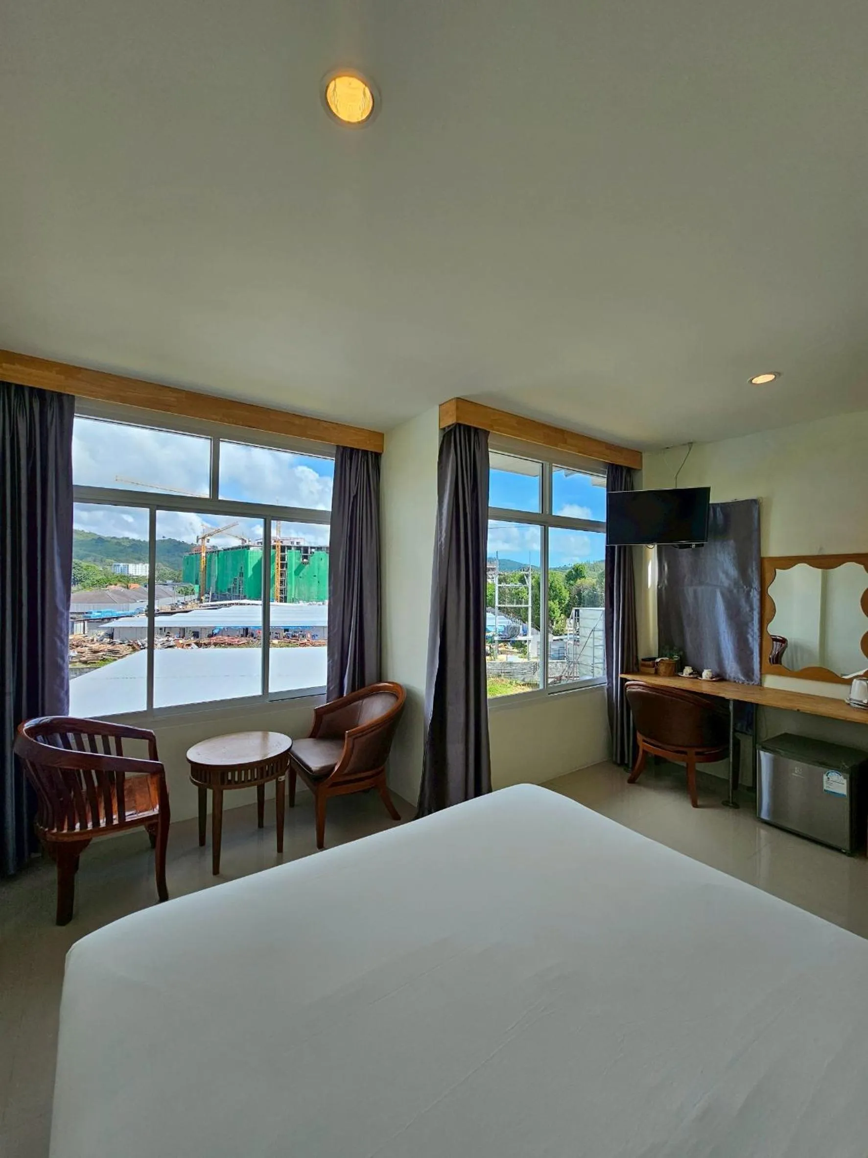 Bed in Dwell Phuket Airport Hotel at Naiyang