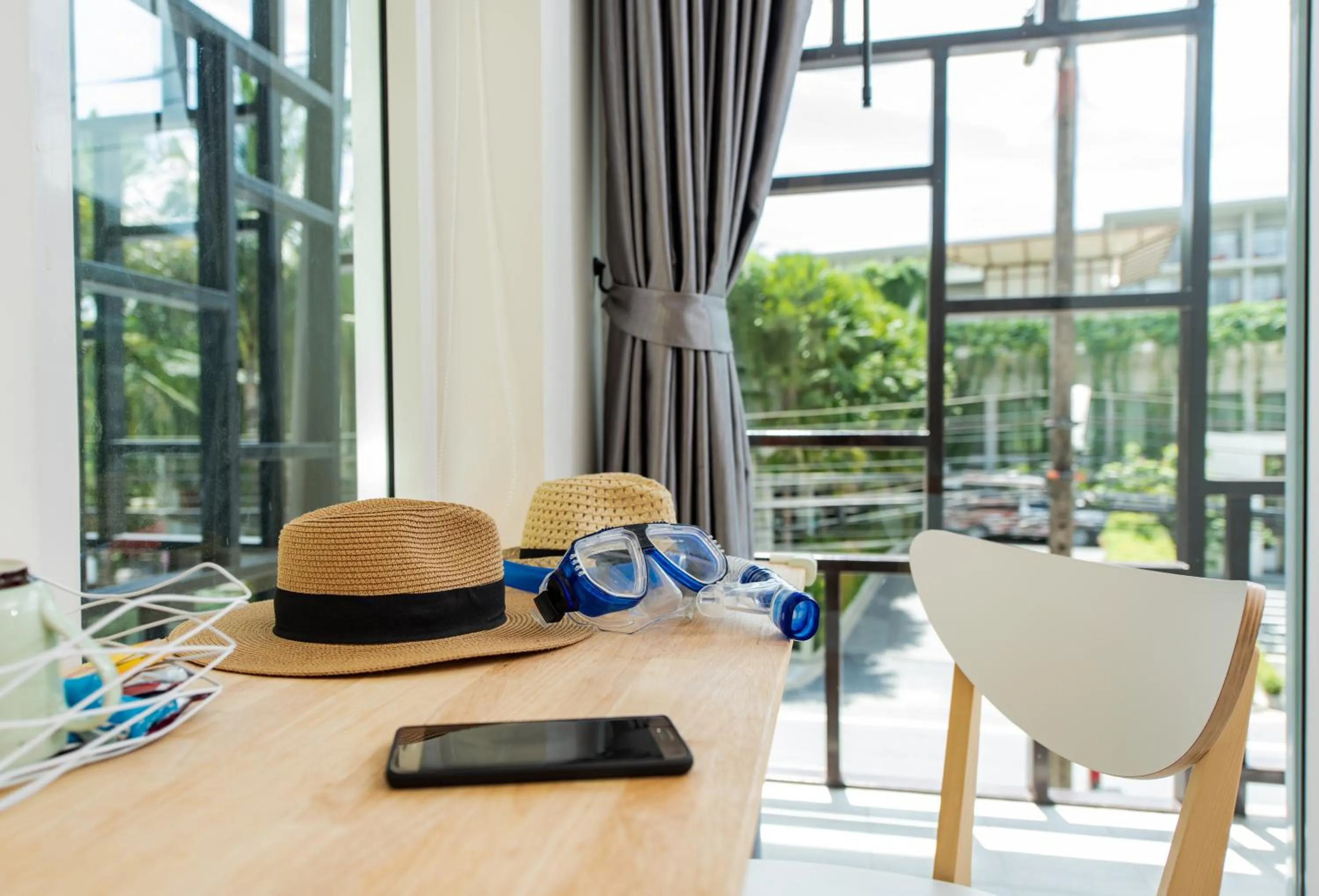 Seating area in Dwell Phuket Airport Hotel at Naiyang