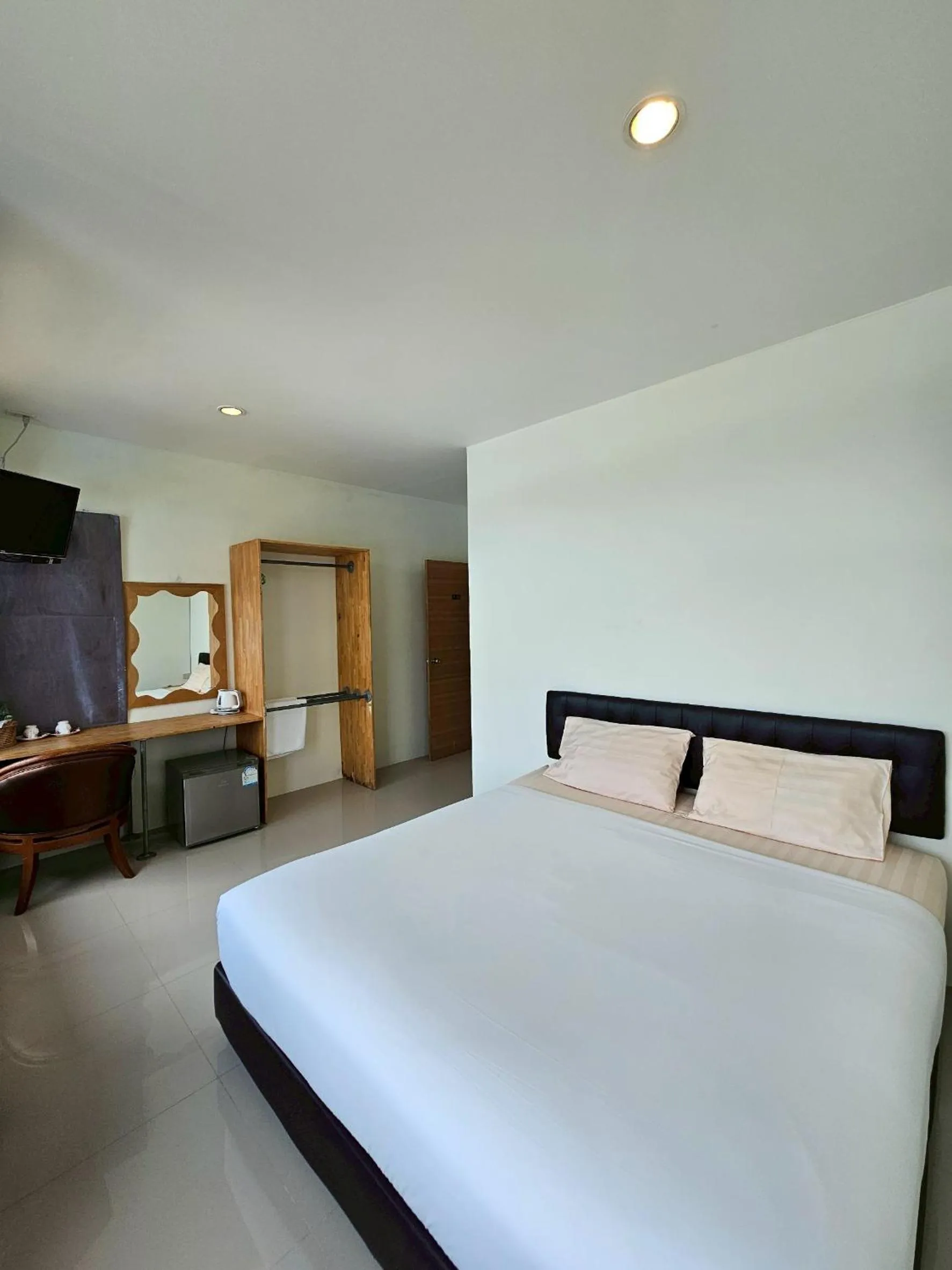 Bed in Dwell Phuket Airport Hotel at Naiyang