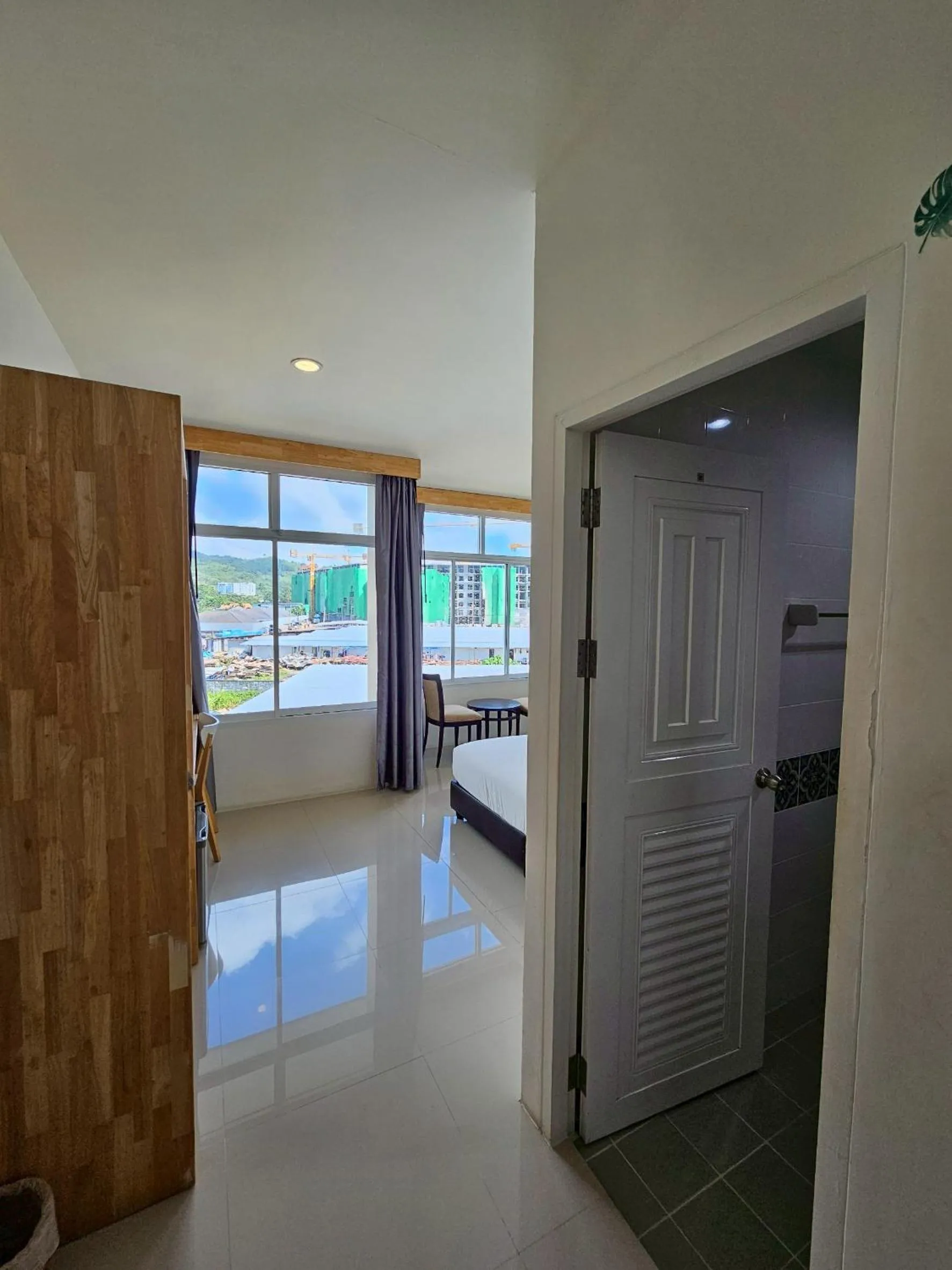 Bed in Dwell Phuket Airport Hotel at Naiyang