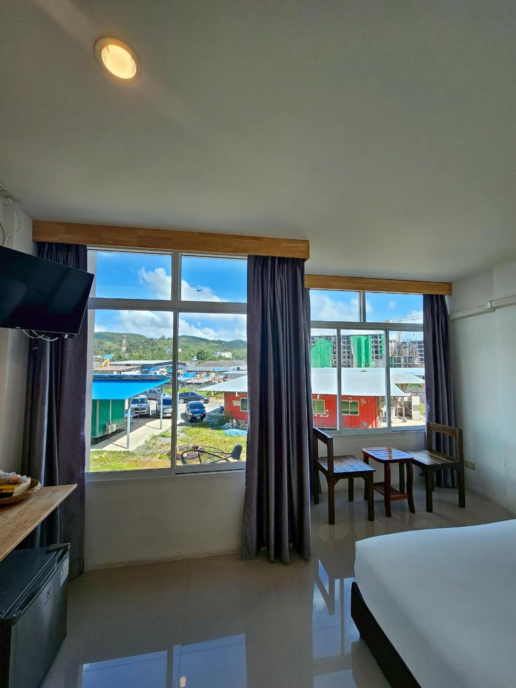 Bed in Dwell Phuket Airport Hotel at Naiyang