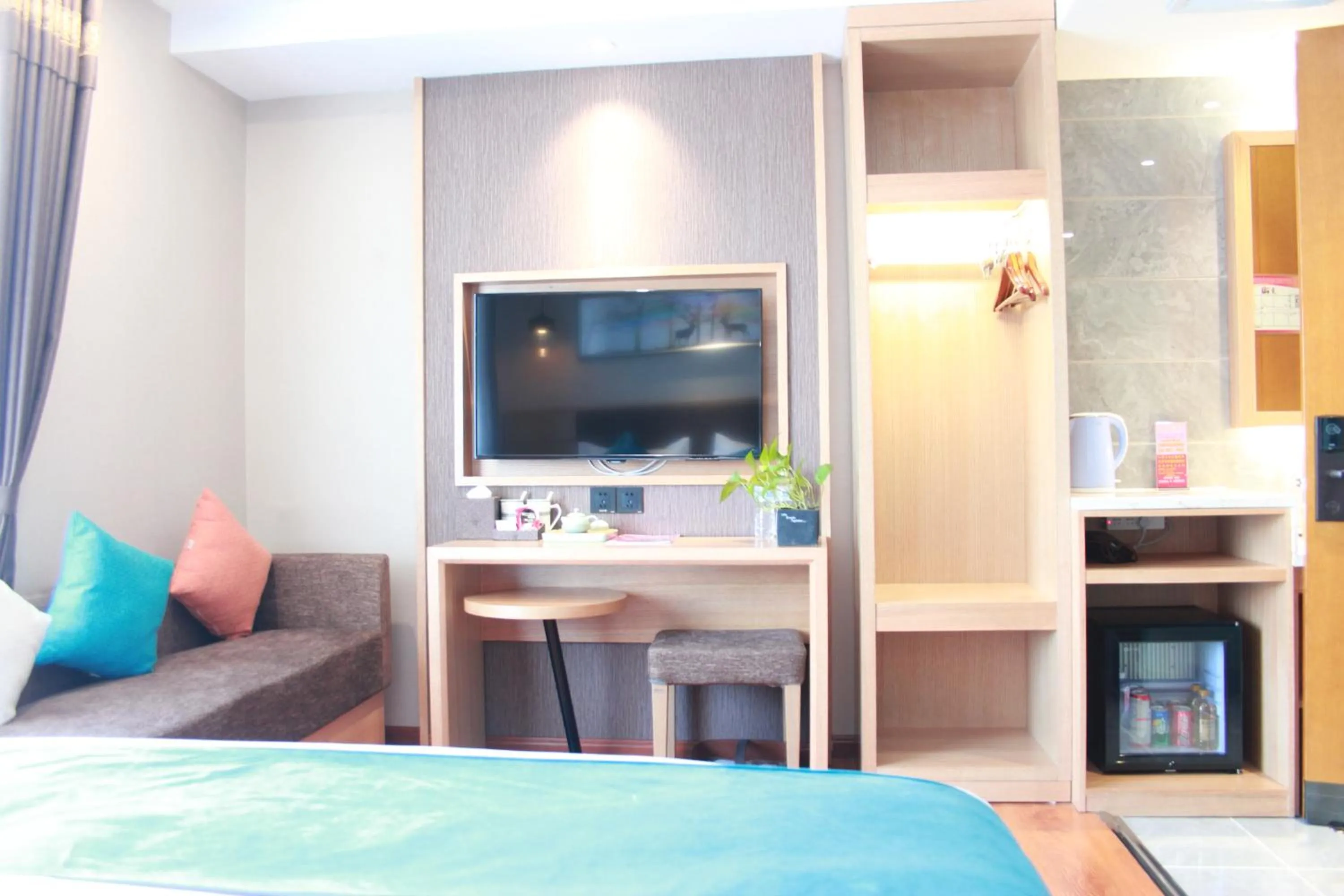 TV and multimedia in Harbin Joy Boutique Hotel