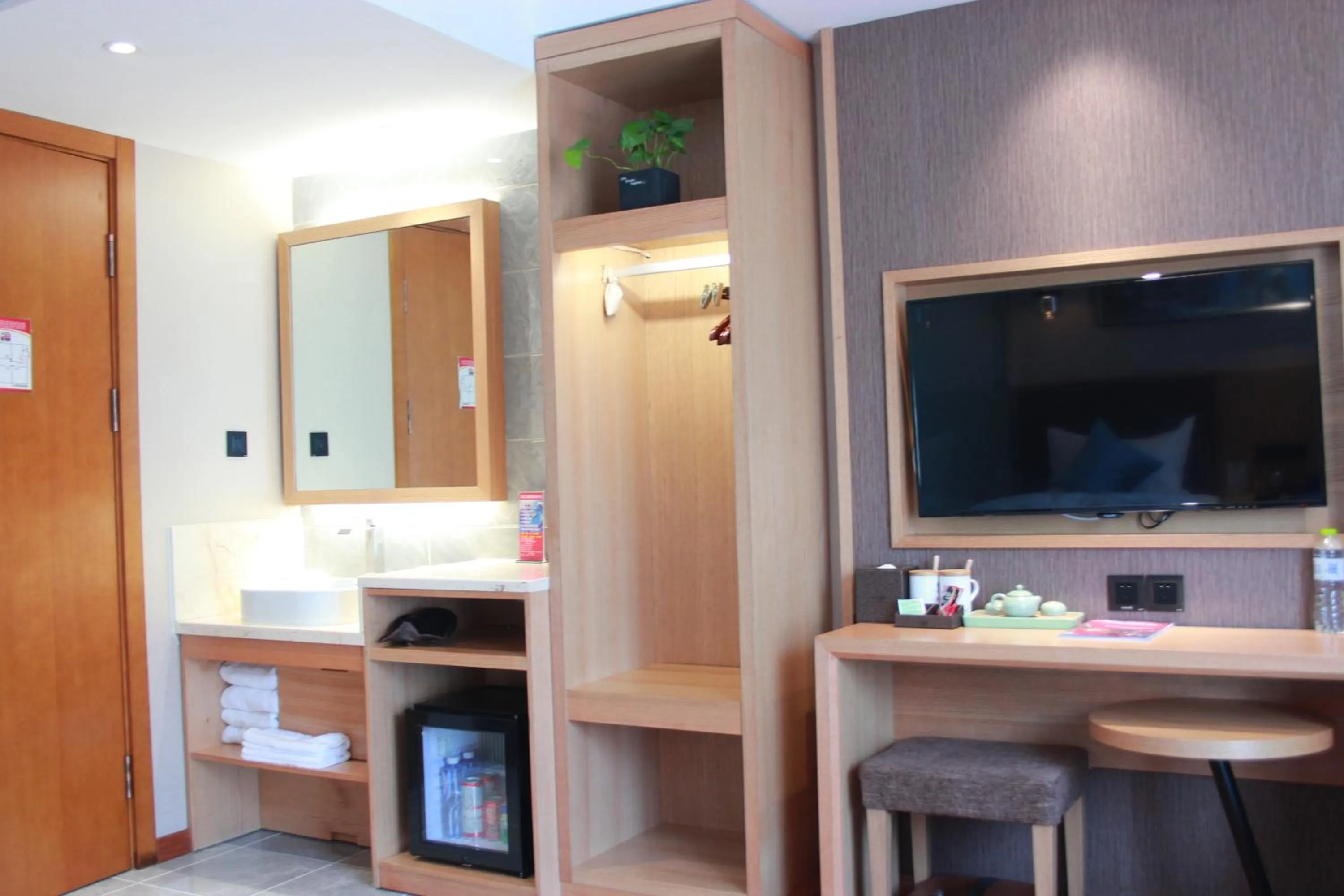 TV and multimedia in Harbin Joy Boutique Hotel