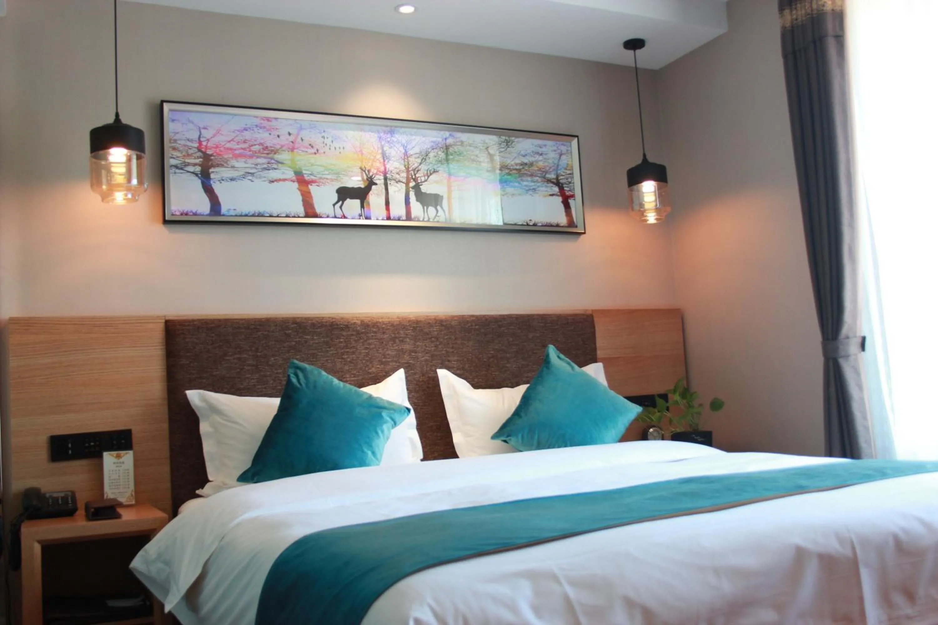 Bed in Harbin Joy Boutique Hotel