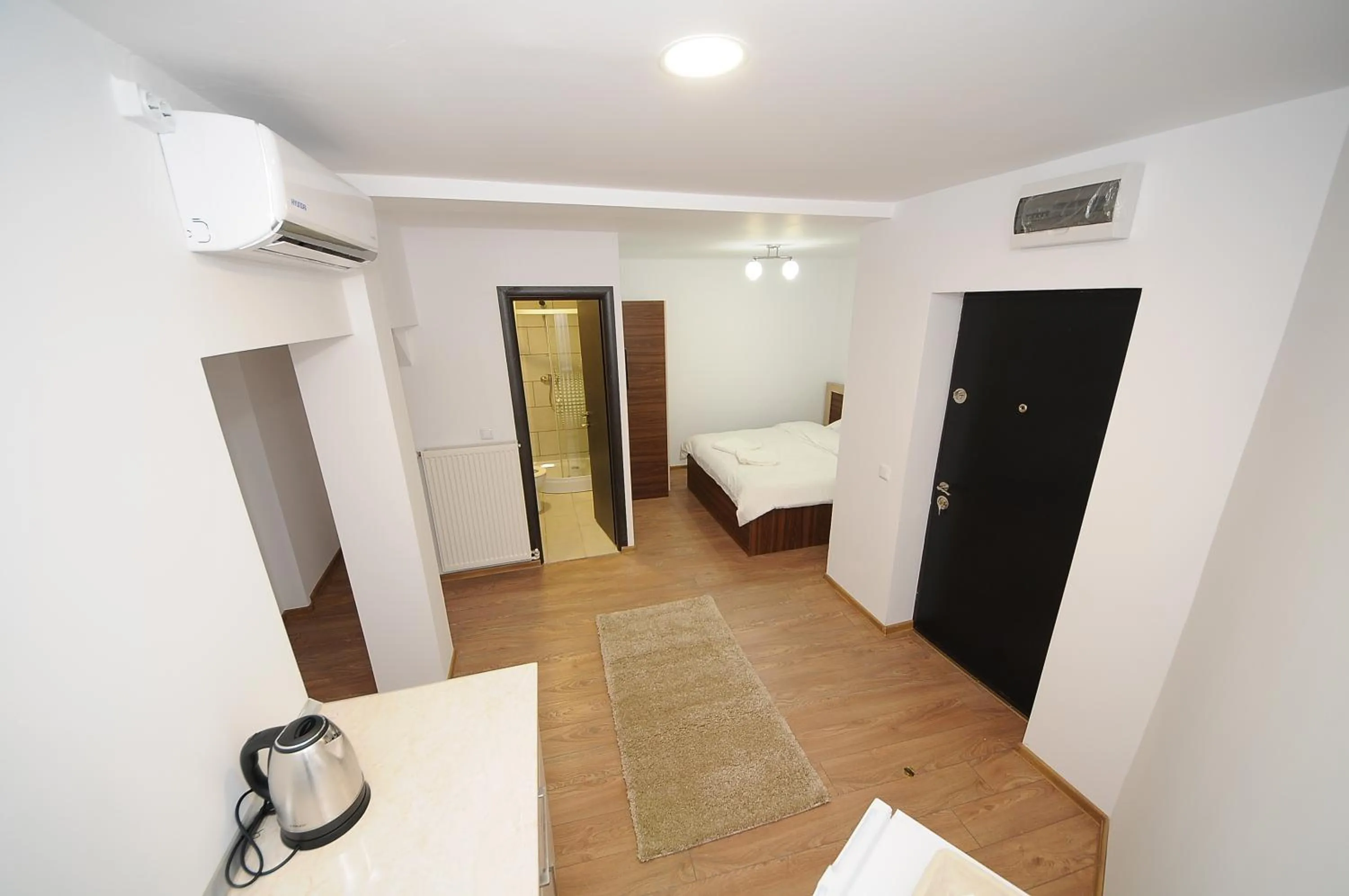 Living room, Bed in Citadel Aparthotel