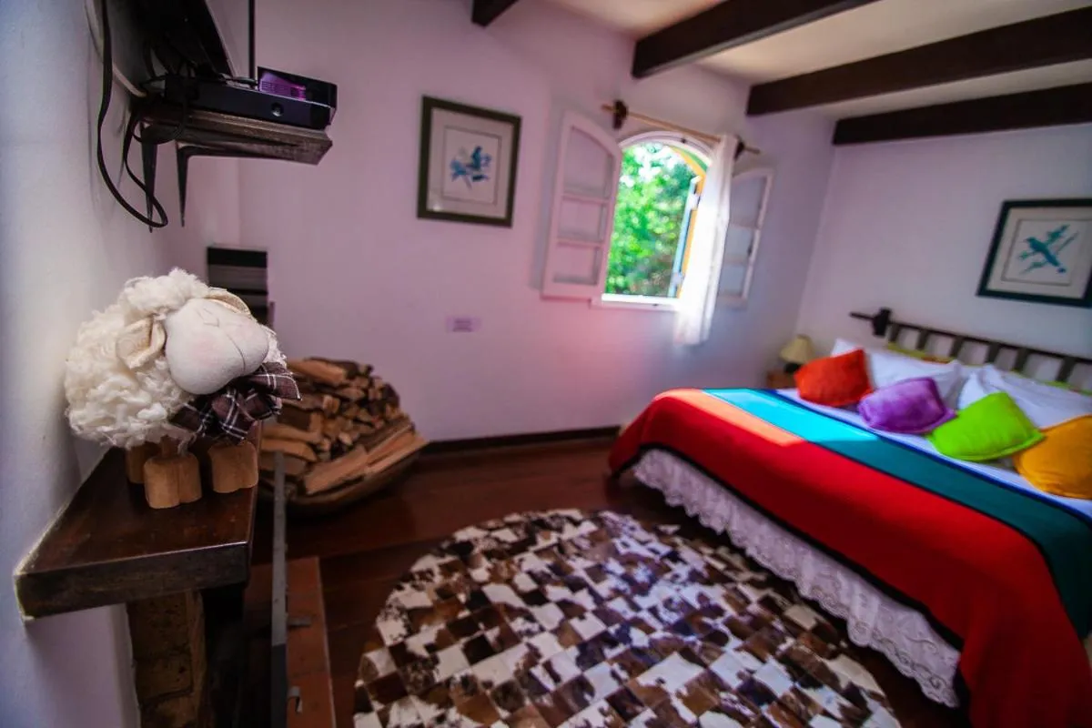 Photo of the whole room, Bed in Pousada Villa D'Amore