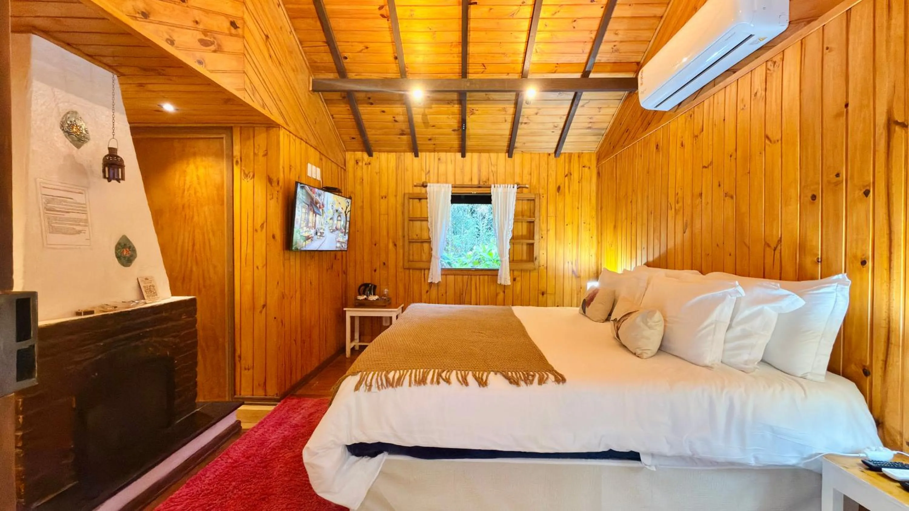 Bed in Pousada Villa D'Amore