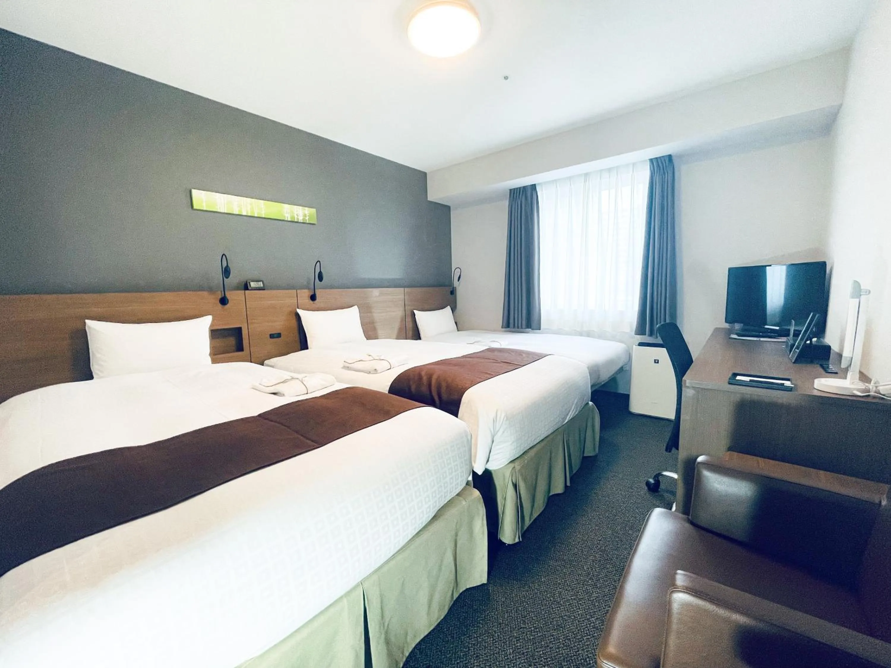 Bed in Smile Hotel Premium Sapporo Susukino