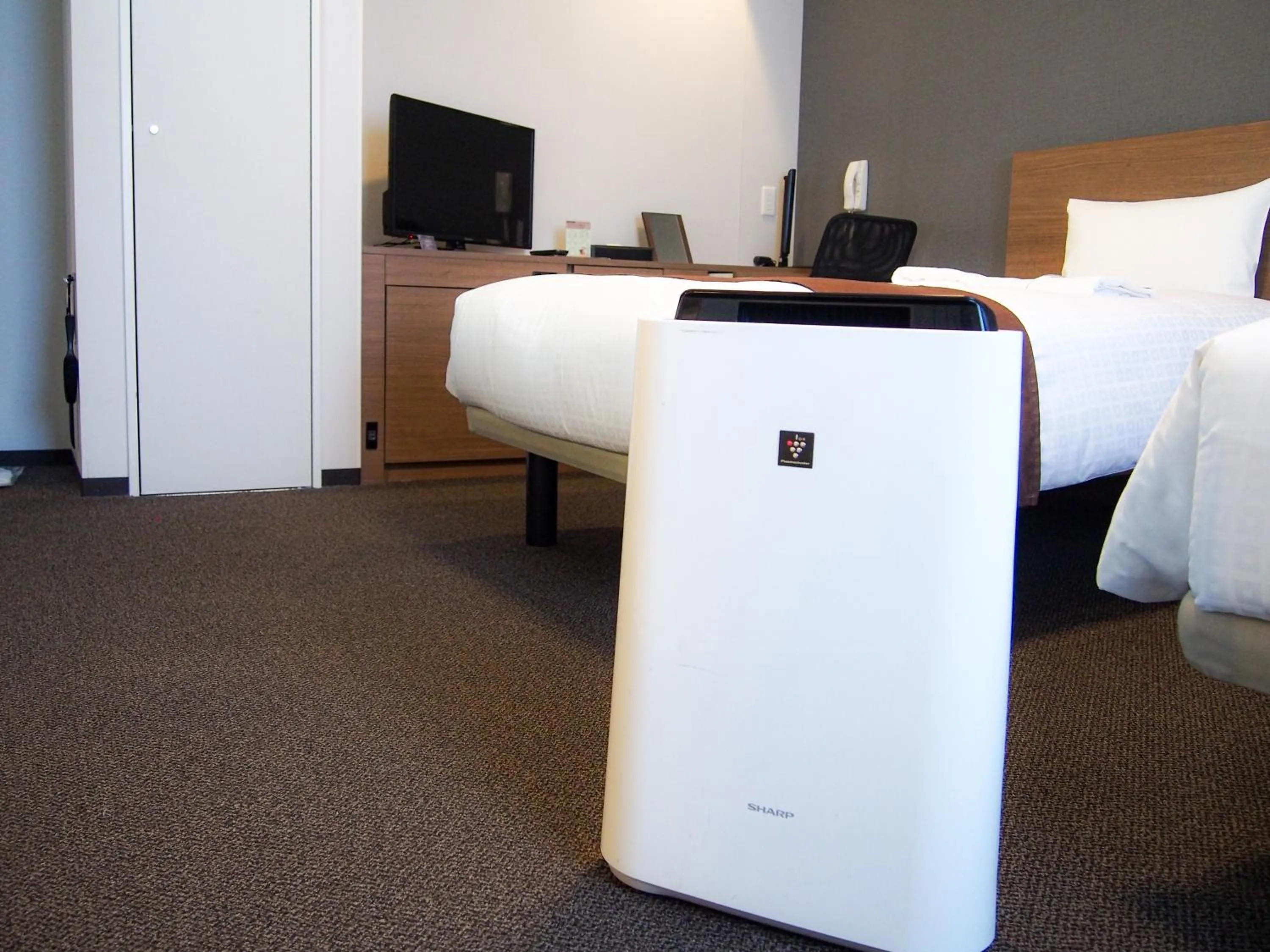 Bed in Smile Hotel Premium Sapporo Susukino