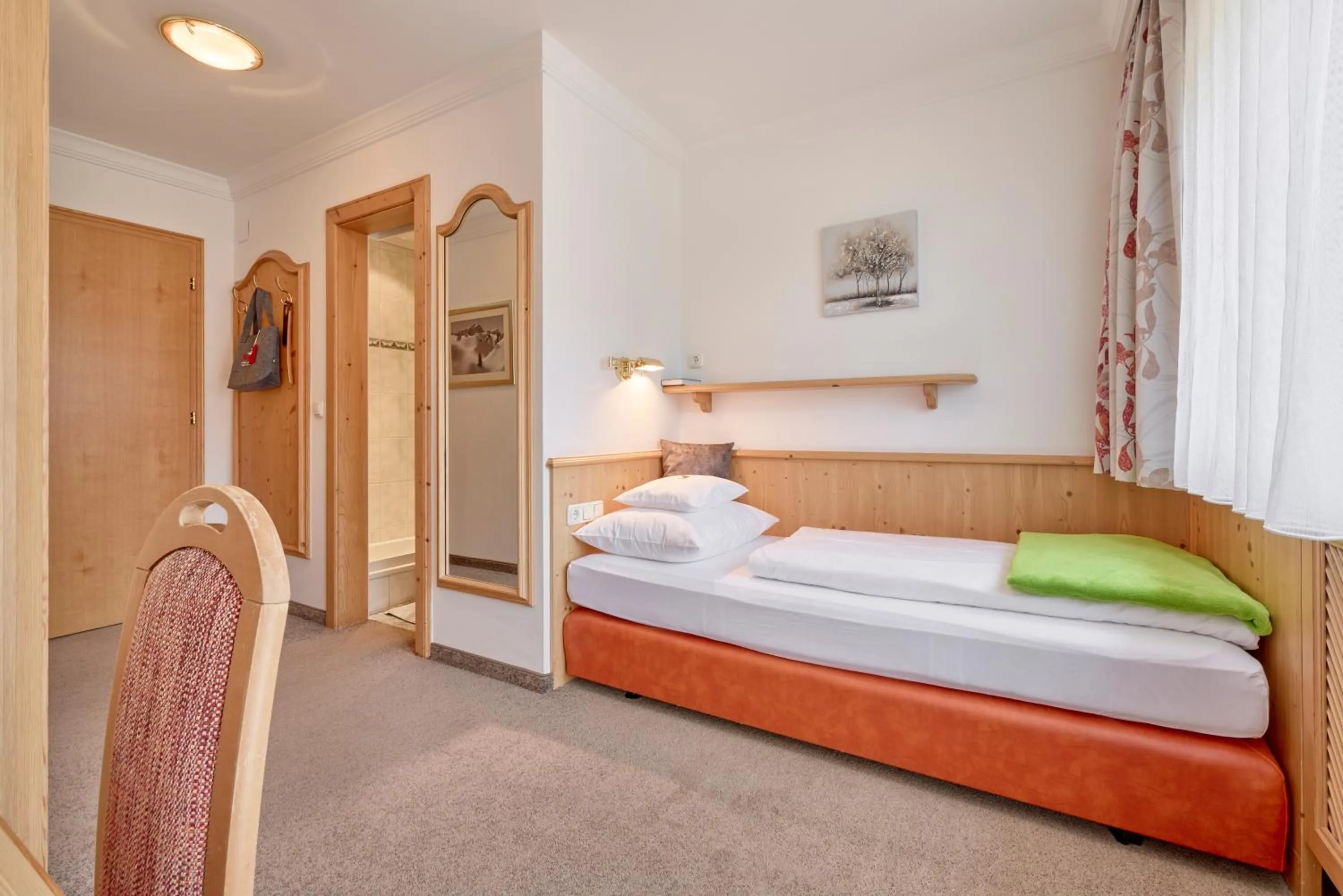 Bed in Hotel Appartement Roggal