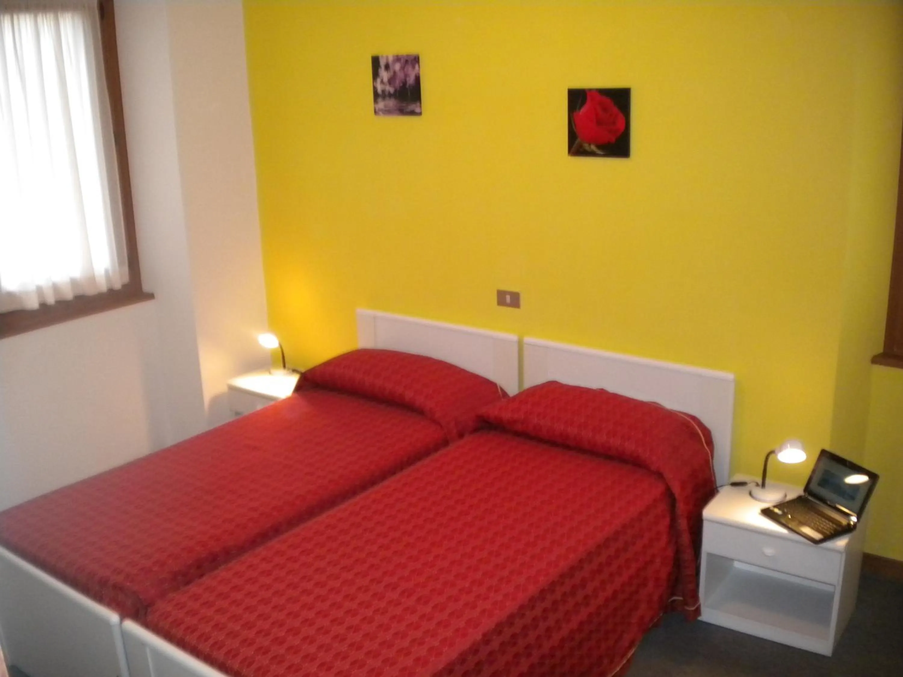 Bed in Hotel Miramonti