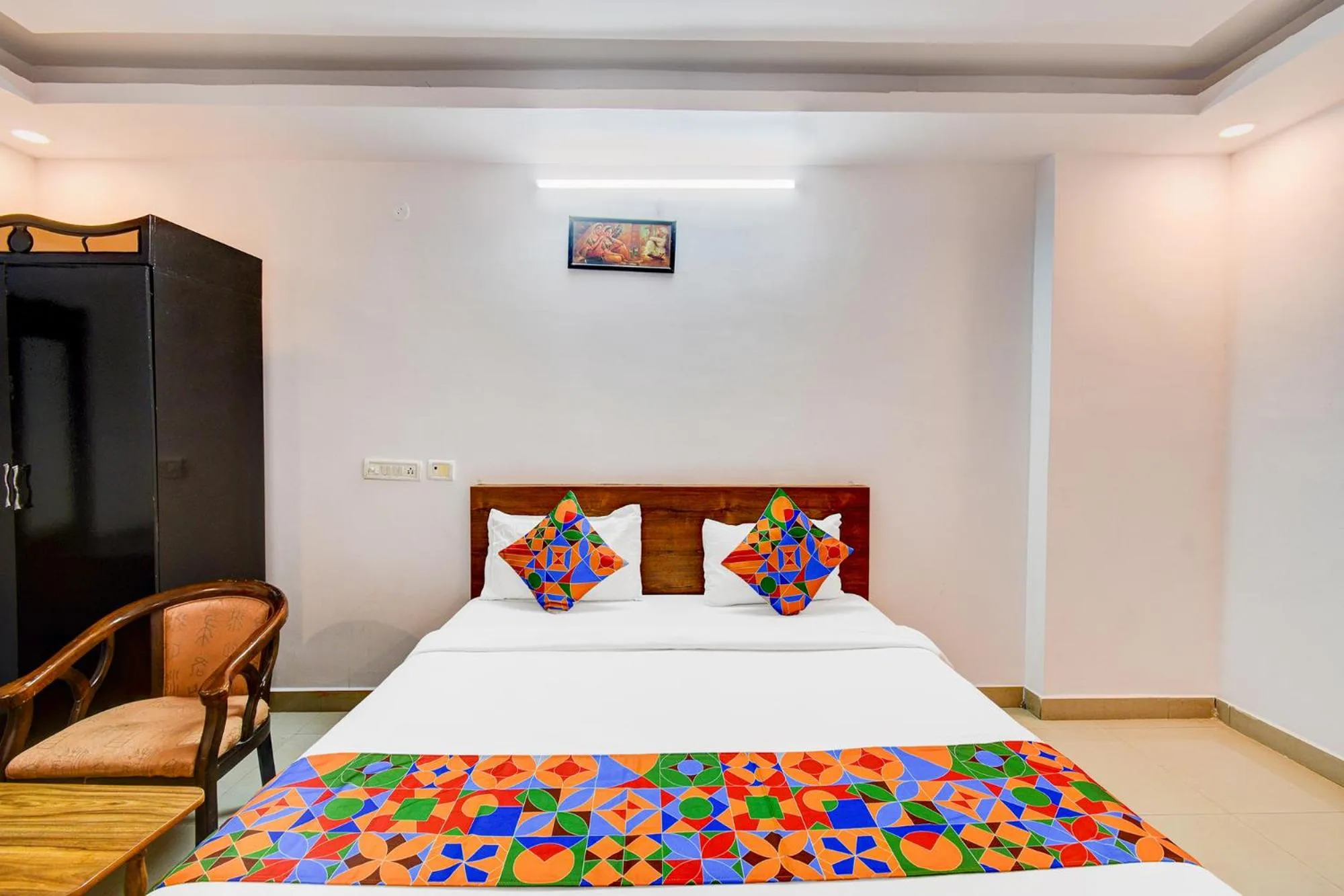 Bed in FabHotel Pushpa Grand