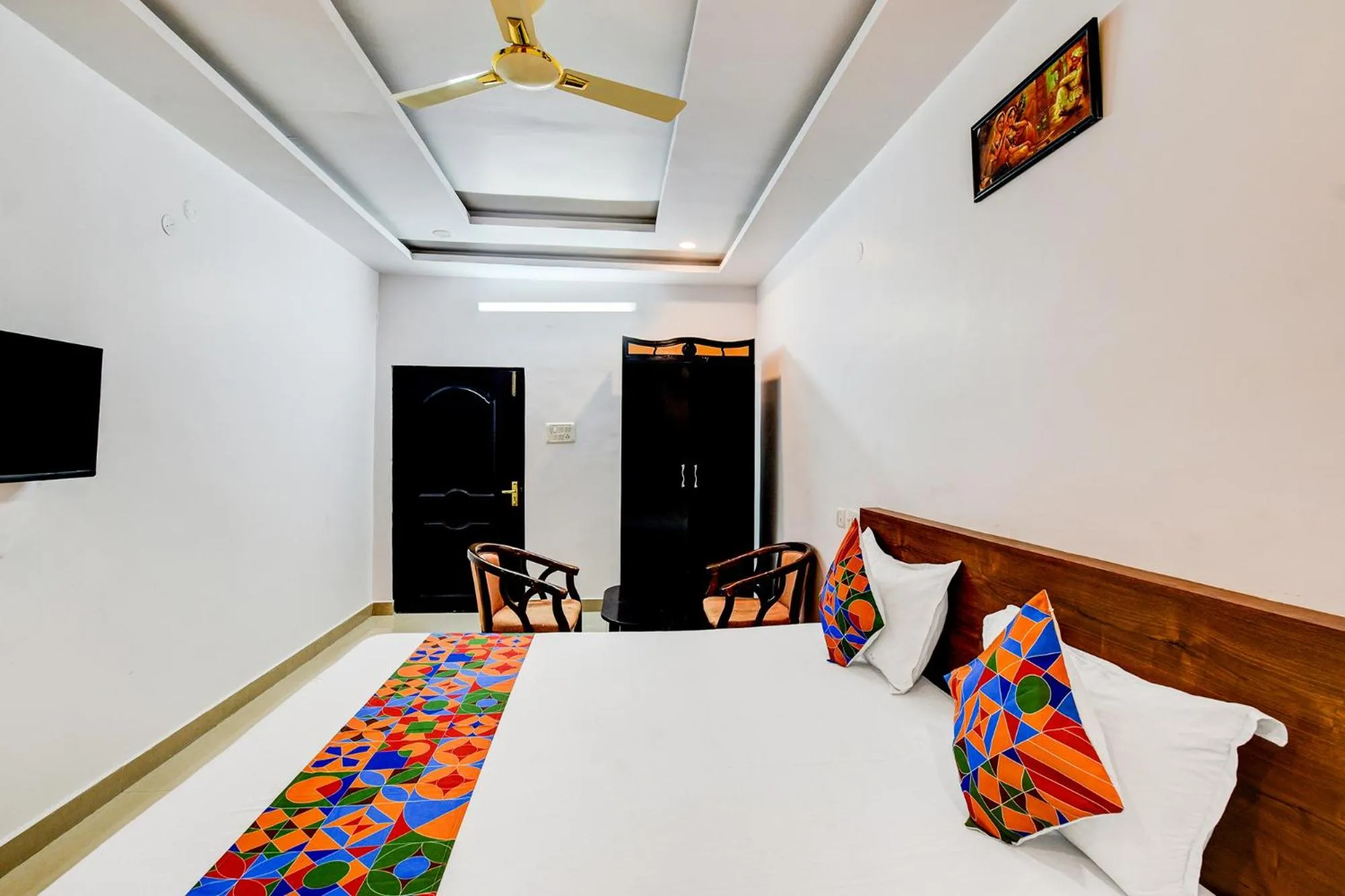 Bed in FabHotel Pushpa Grand