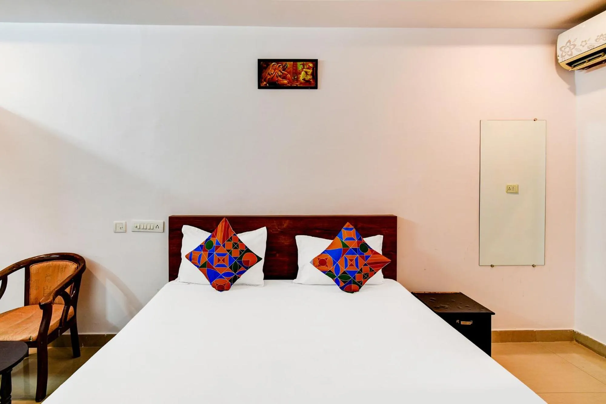Bed in FabHotel Pushpa Grand