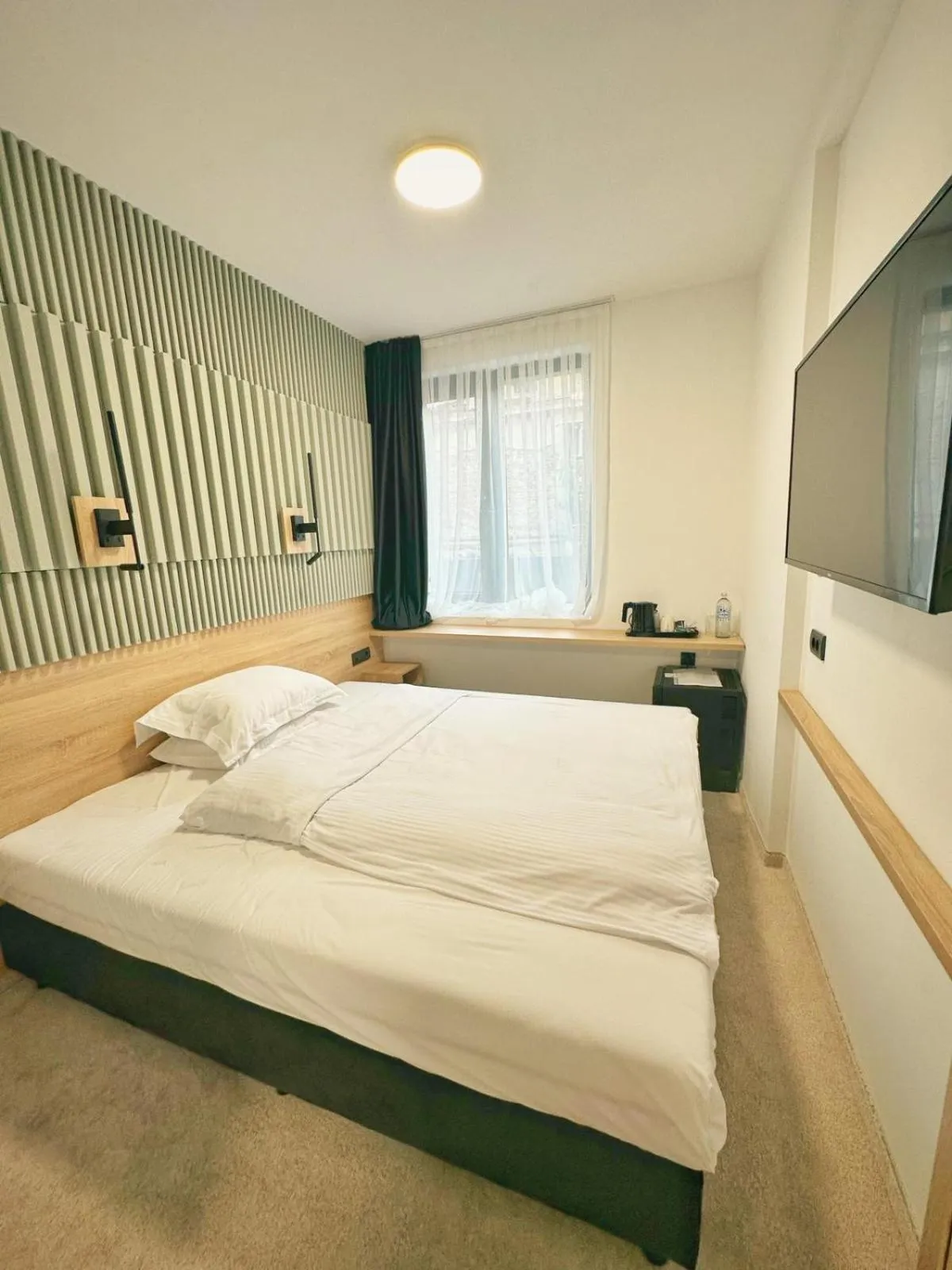 Bed in City Park Hotel