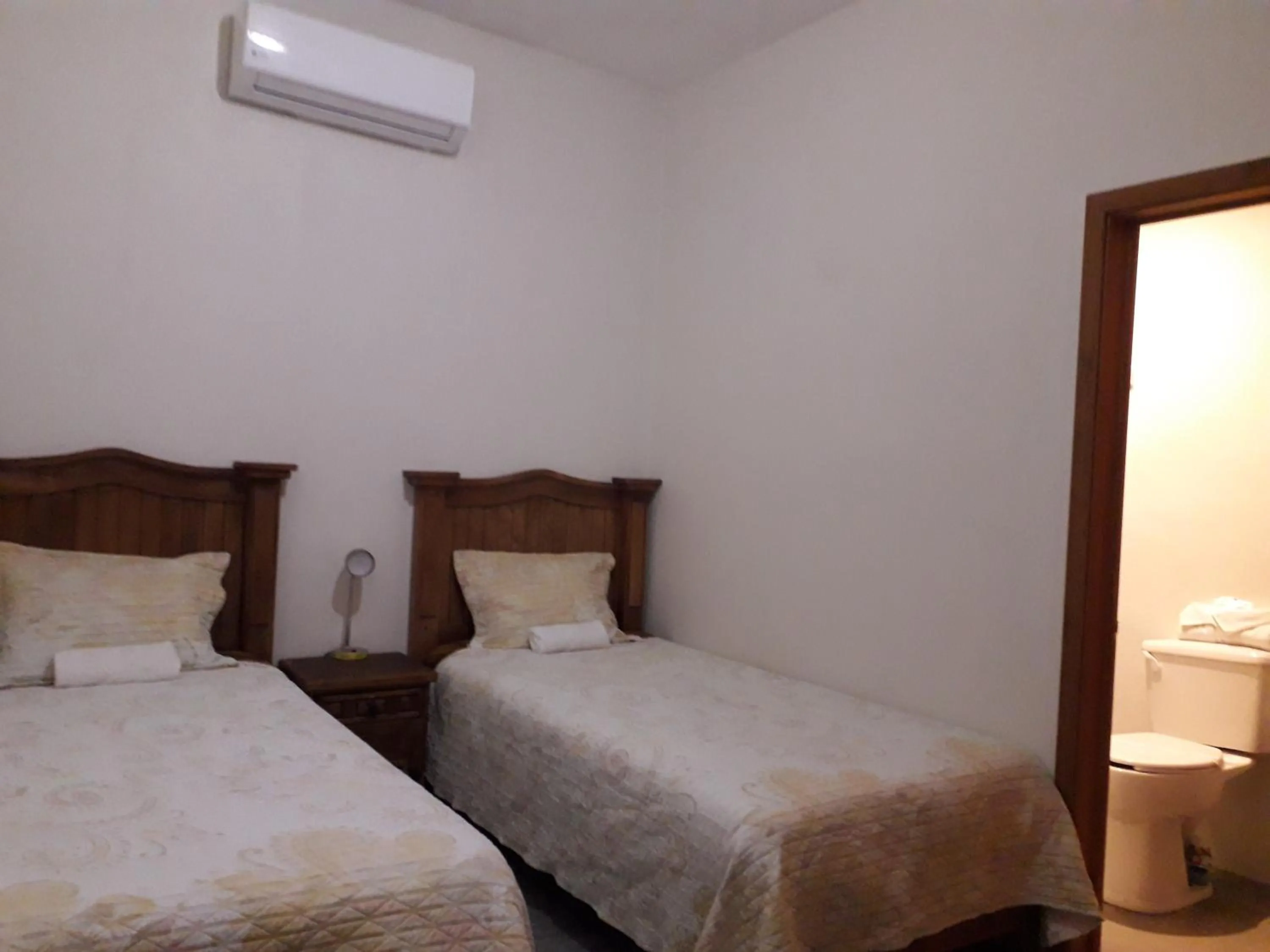 Bed in Hotel Purisima Concepción