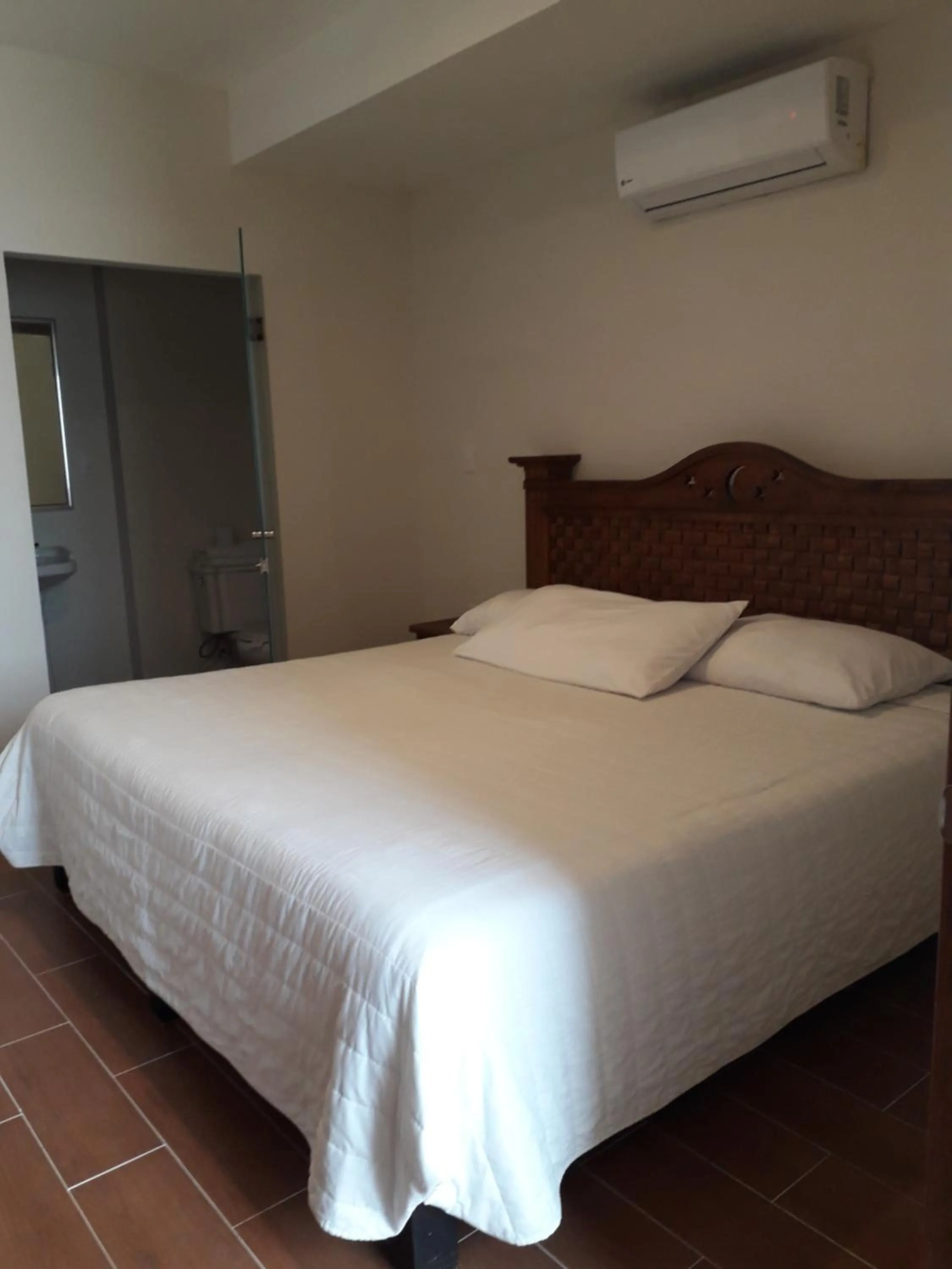 Bed in Hotel Purisima Concepción