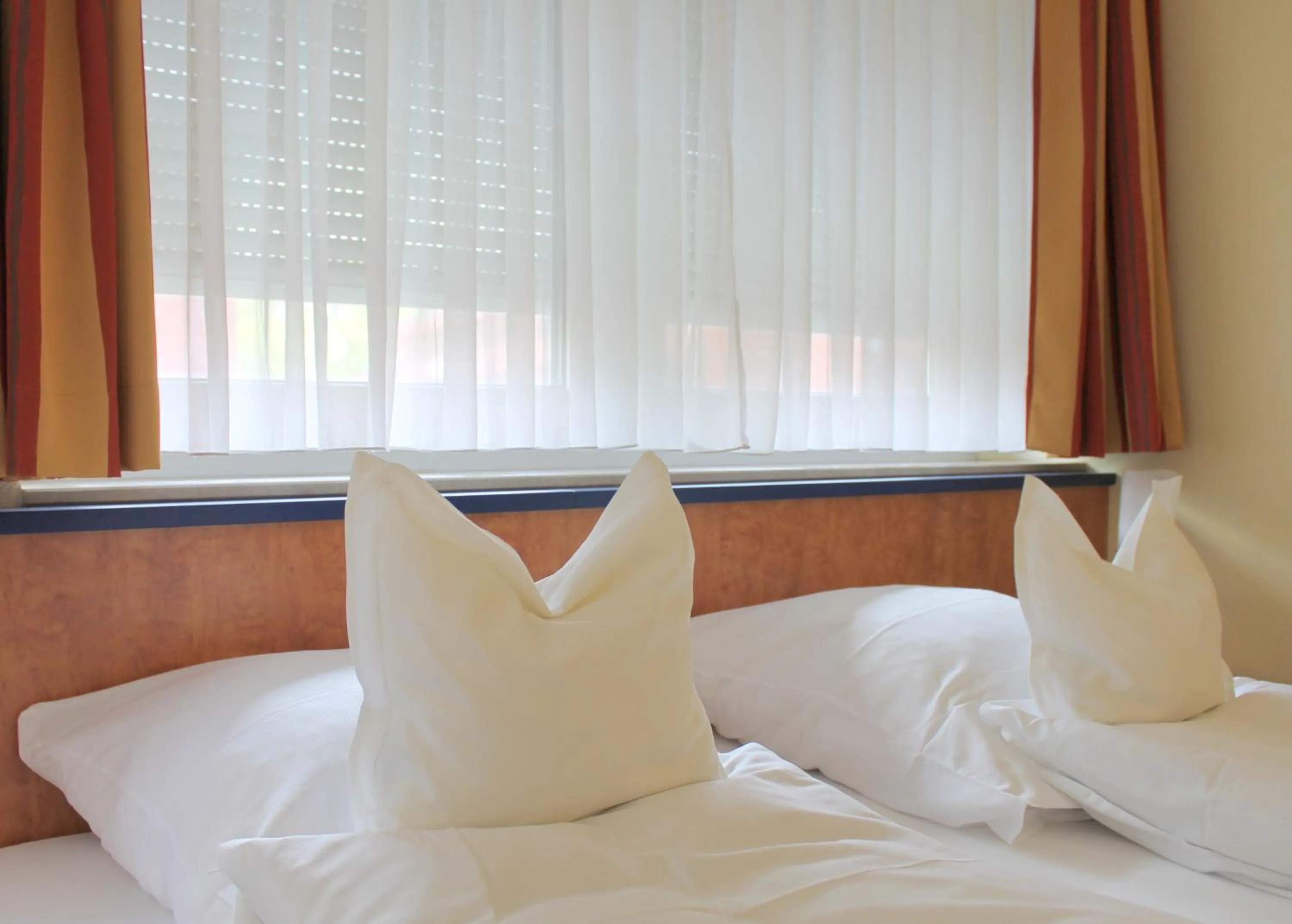 Bed in Hotel Ostmeier