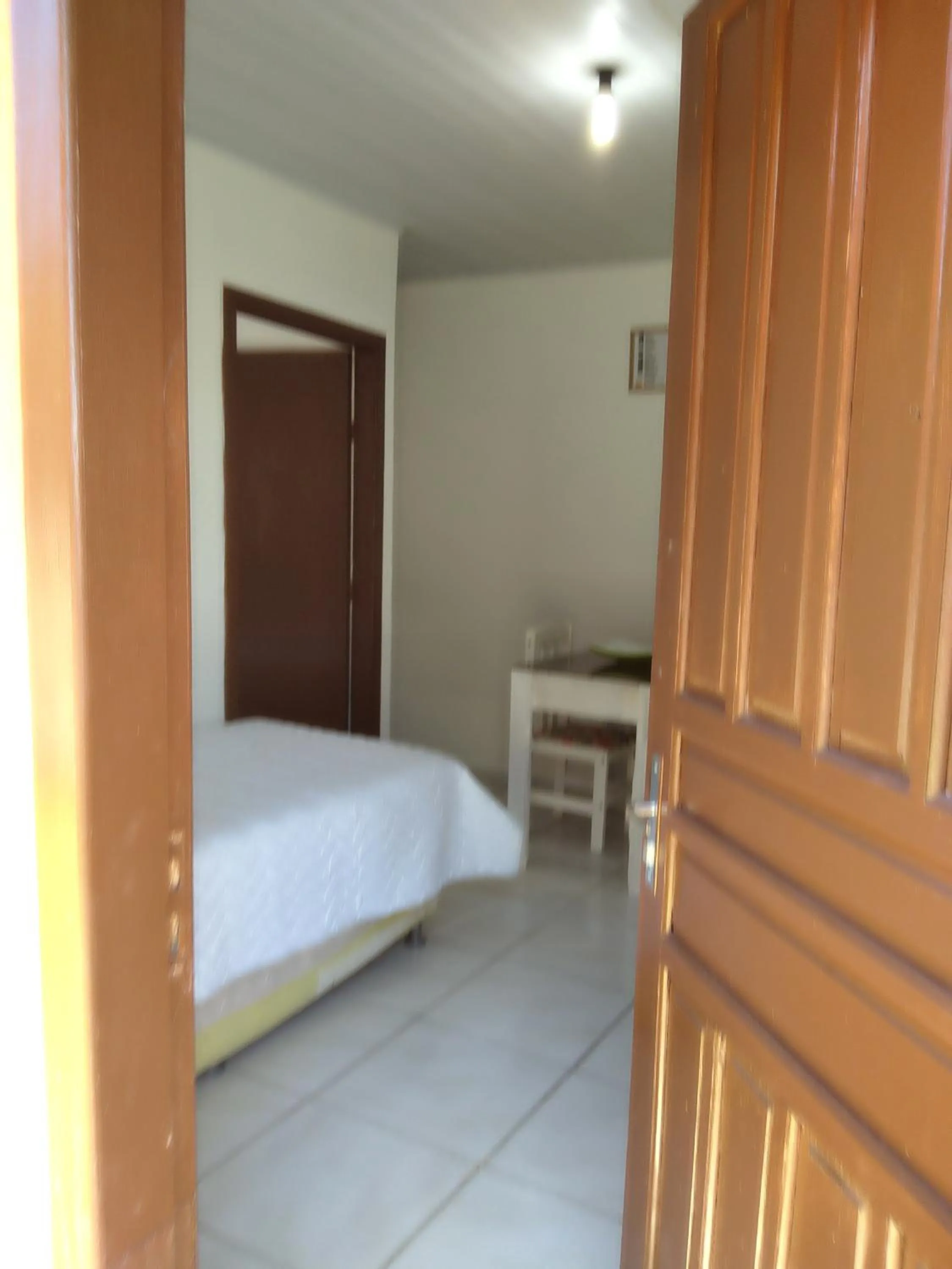 Bed in Pousada da Heloisa