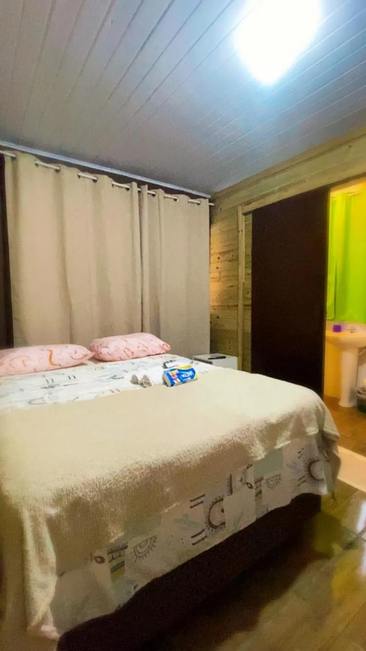 Bed in Pousada da Heloisa