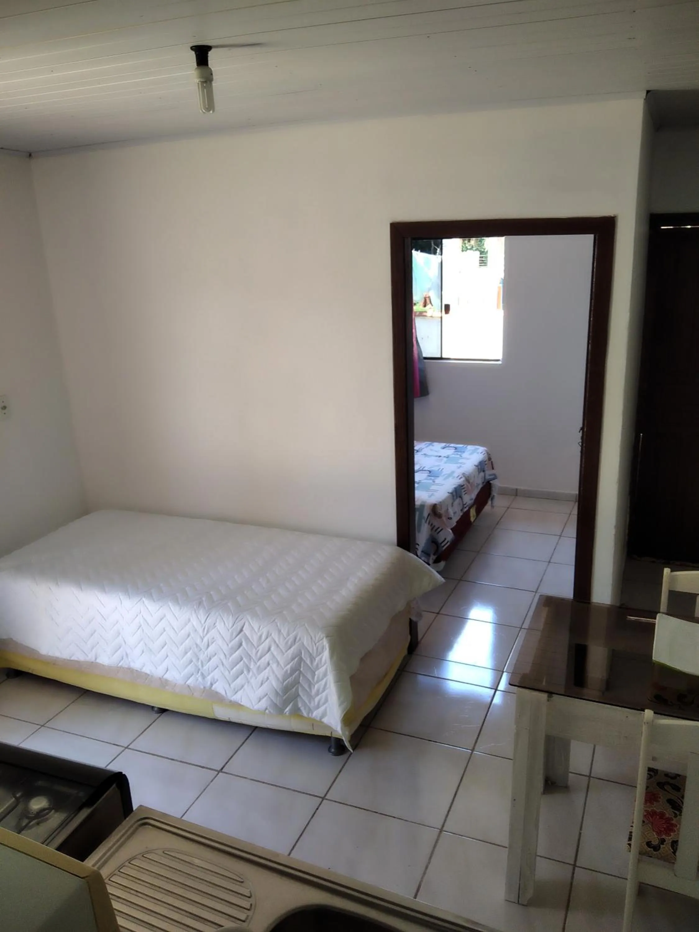 Bed in Pousada da Heloisa