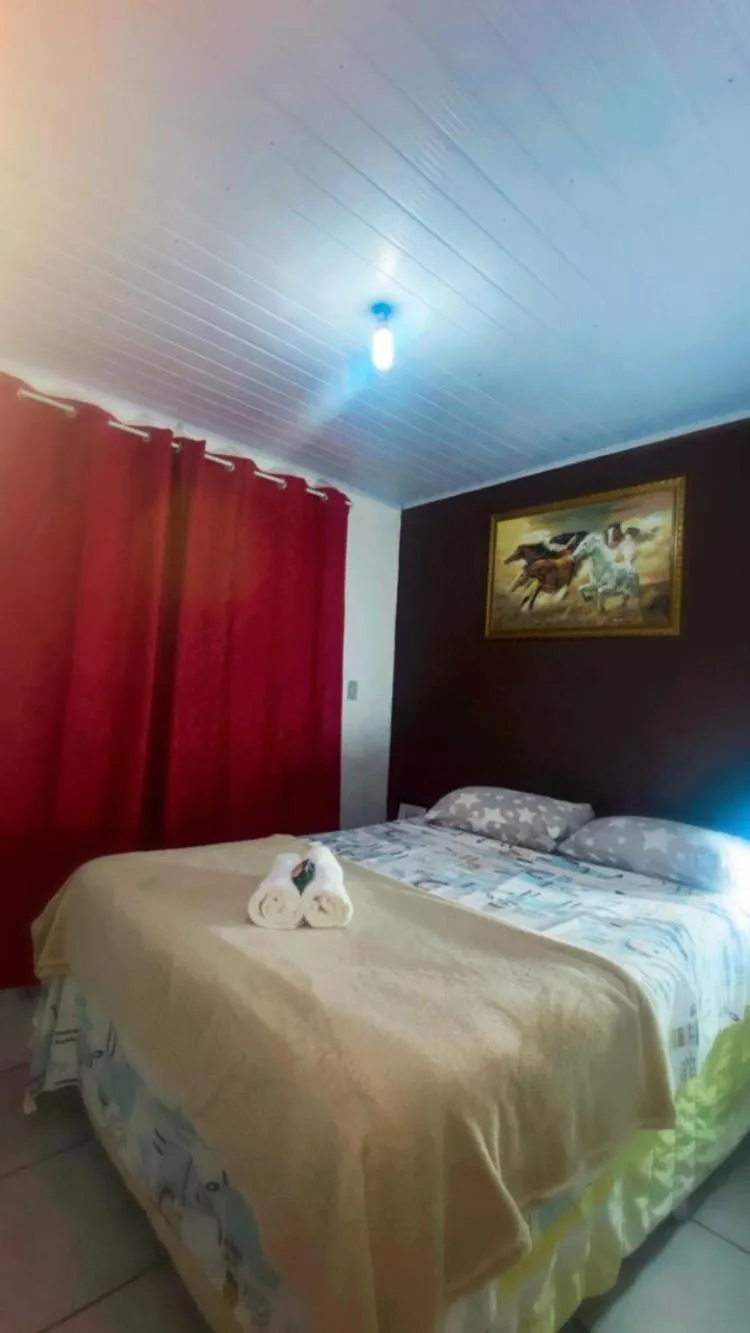 Bed in Pousada da Heloisa