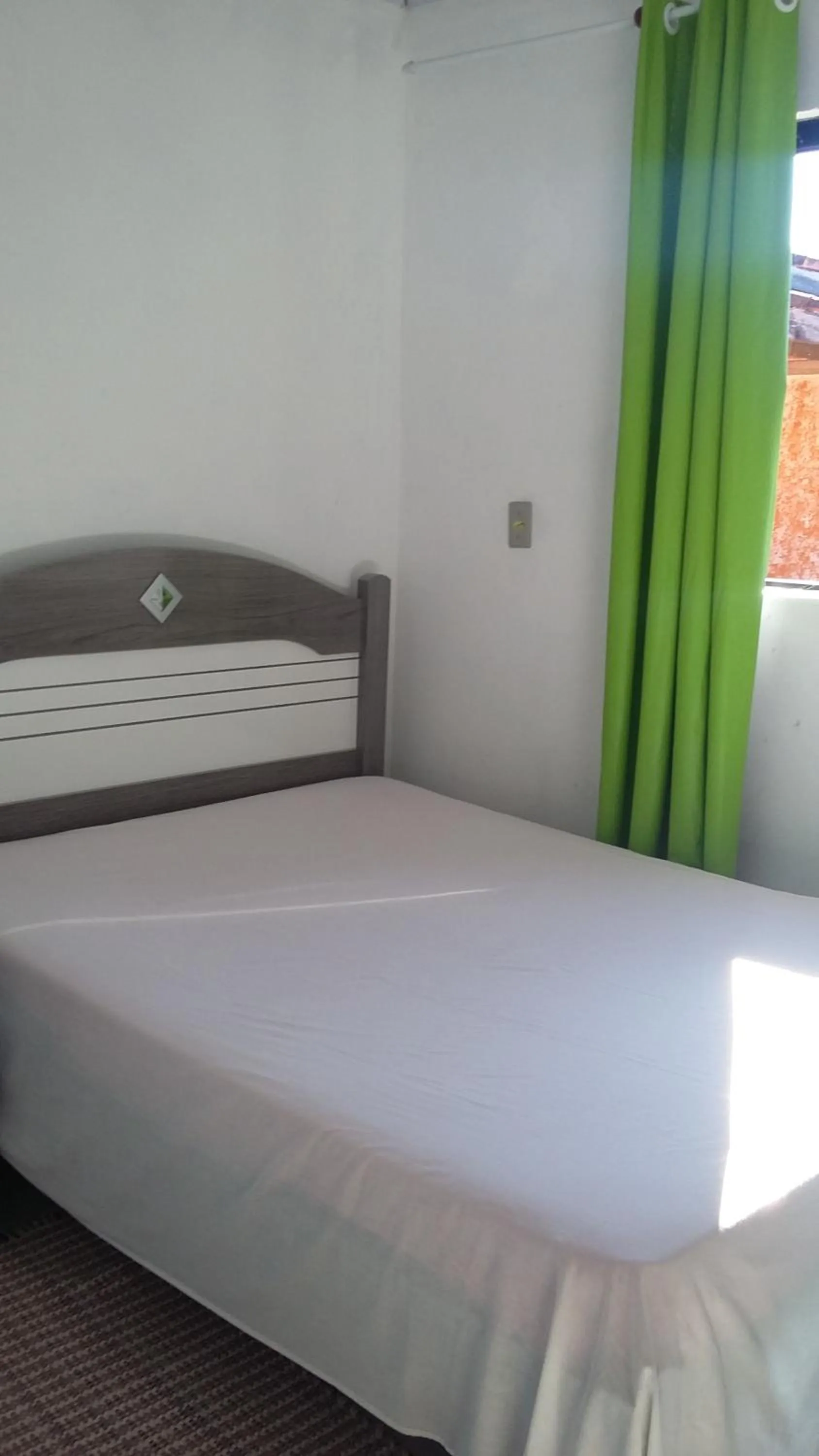 Bed in Pousada da Heloisa