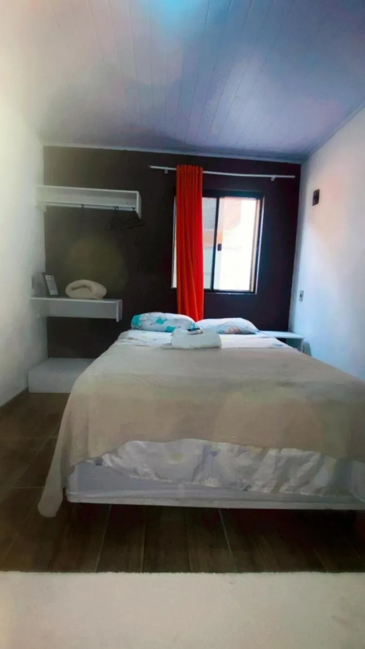 Bed in Pousada da Heloisa
