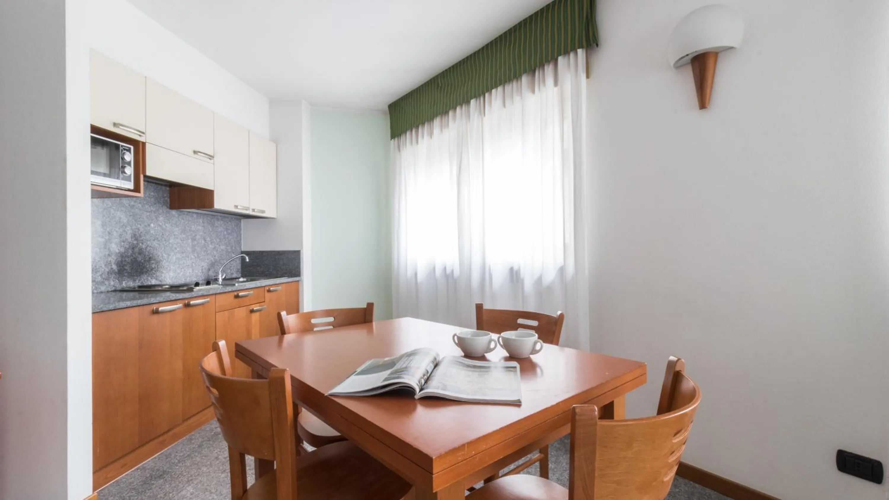 Dining area in Residence Pizzo Scalino