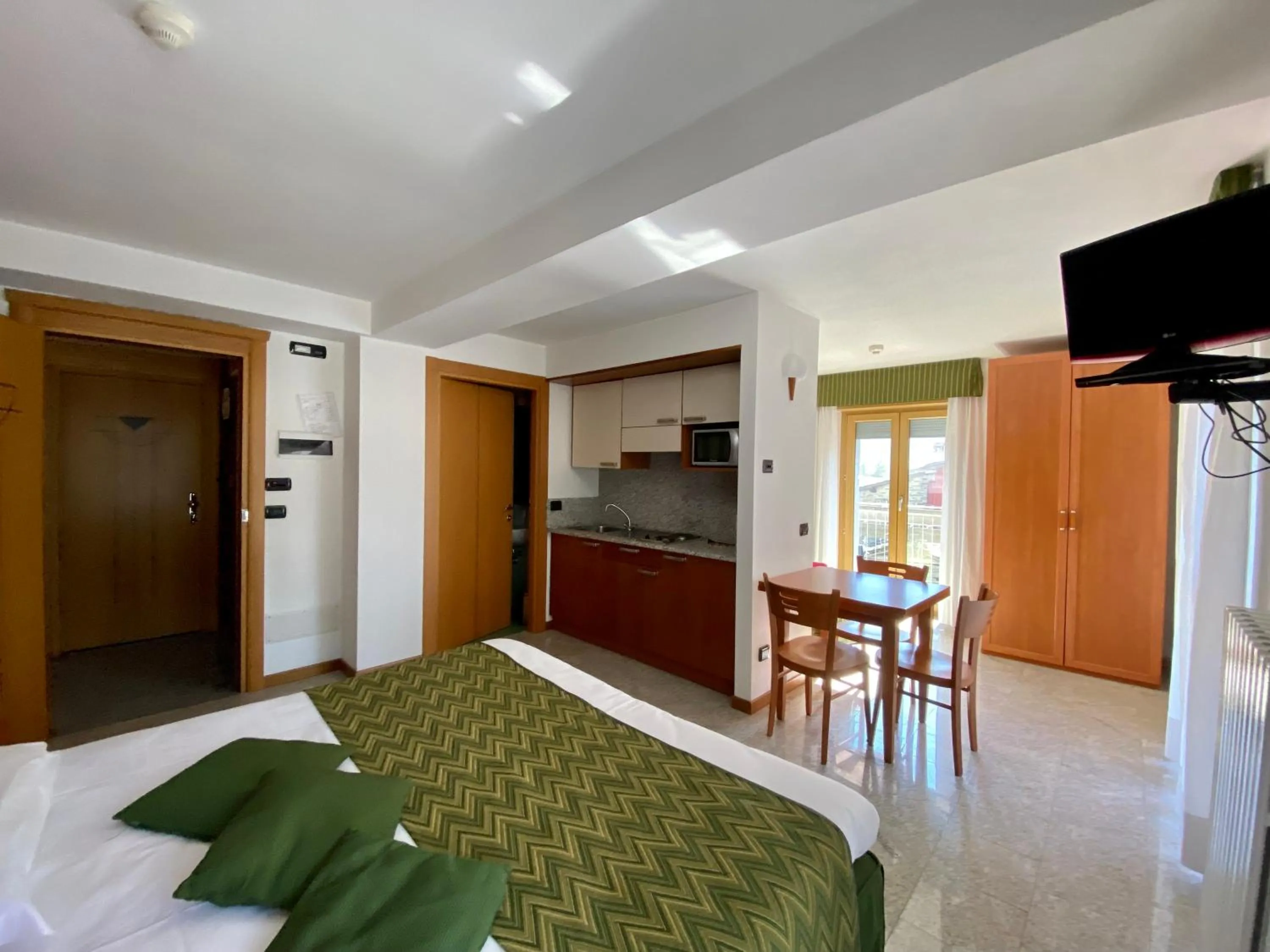 Living room, Bed in Residence Pizzo Scalino