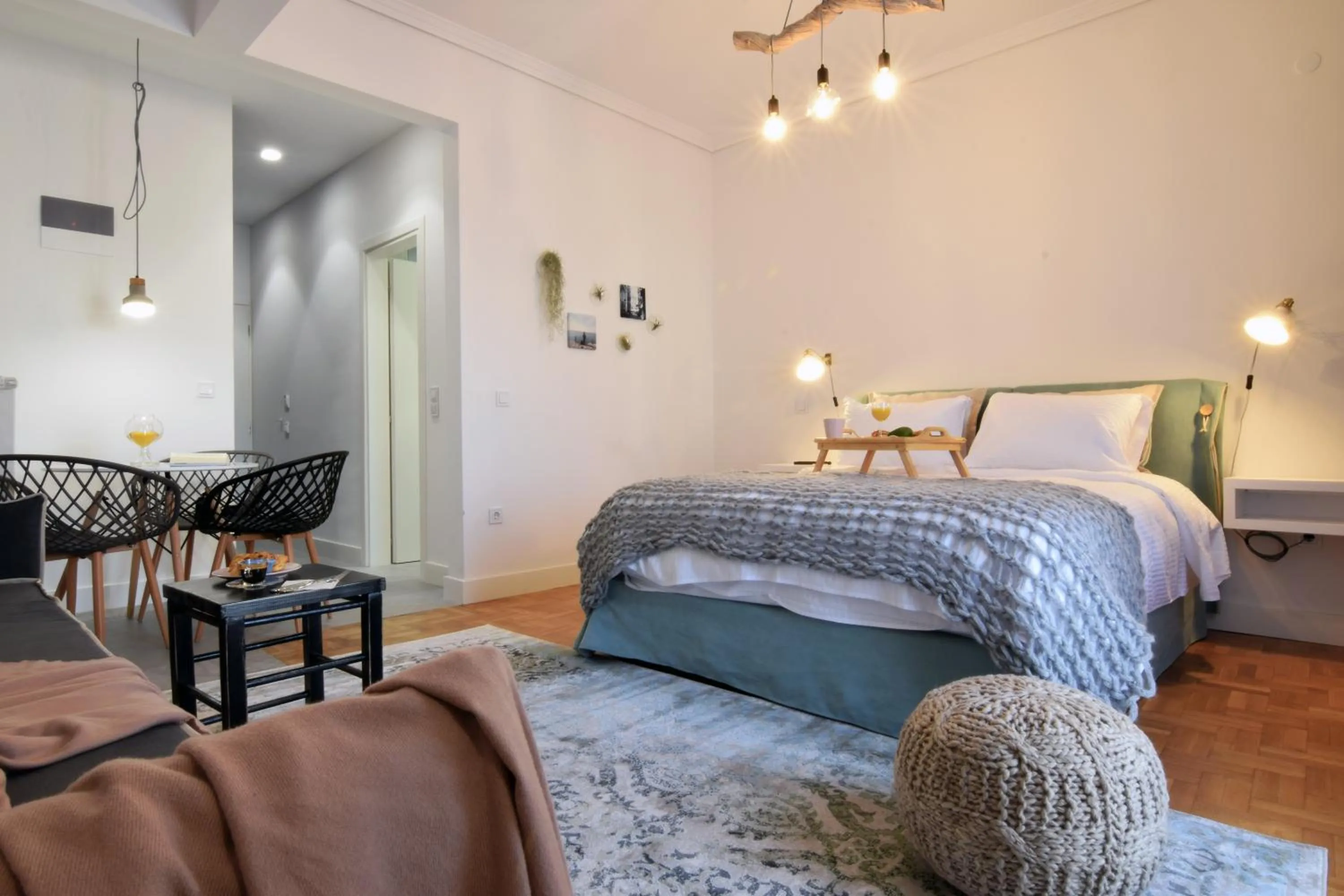 Bed in Grey Studios by Skg Apartments