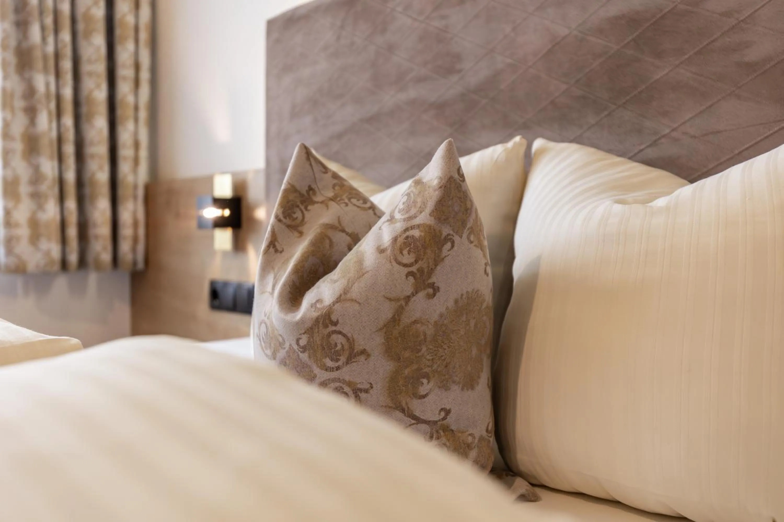 Bed in Das Aparthotel Olympia Tirol