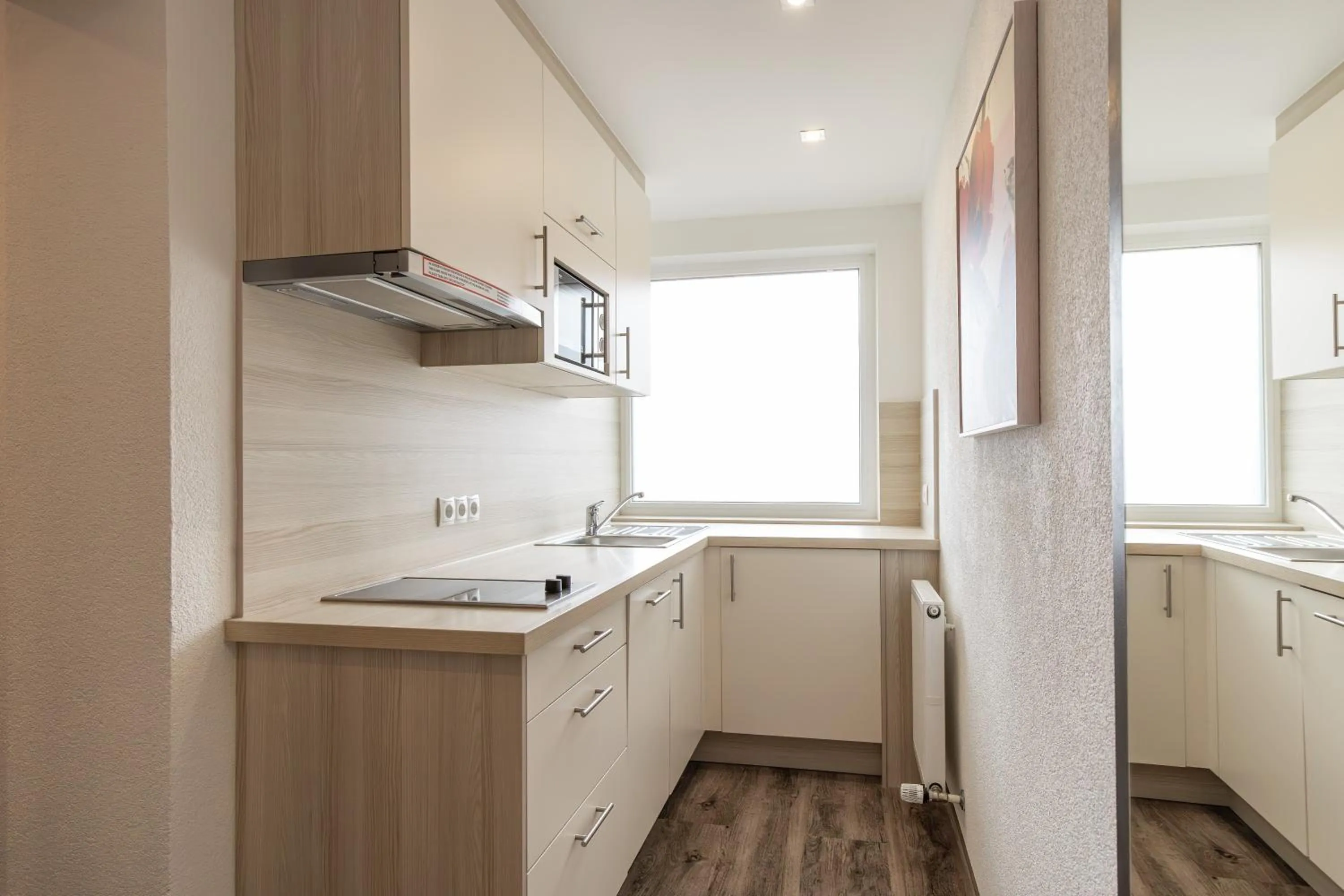 Kitchen or kitchenette in Das Aparthotel Olympia Tirol