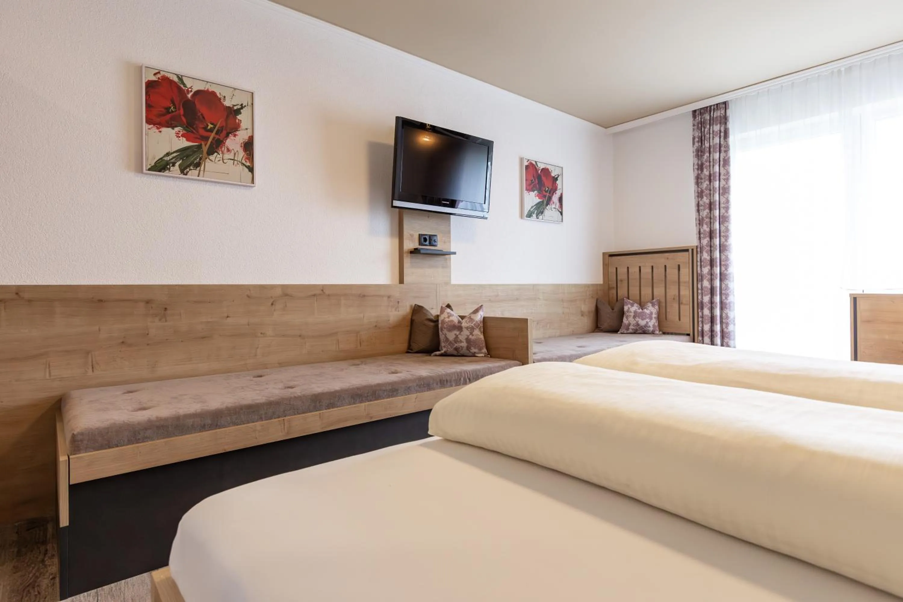 Bed in Das Aparthotel Olympia Tirol