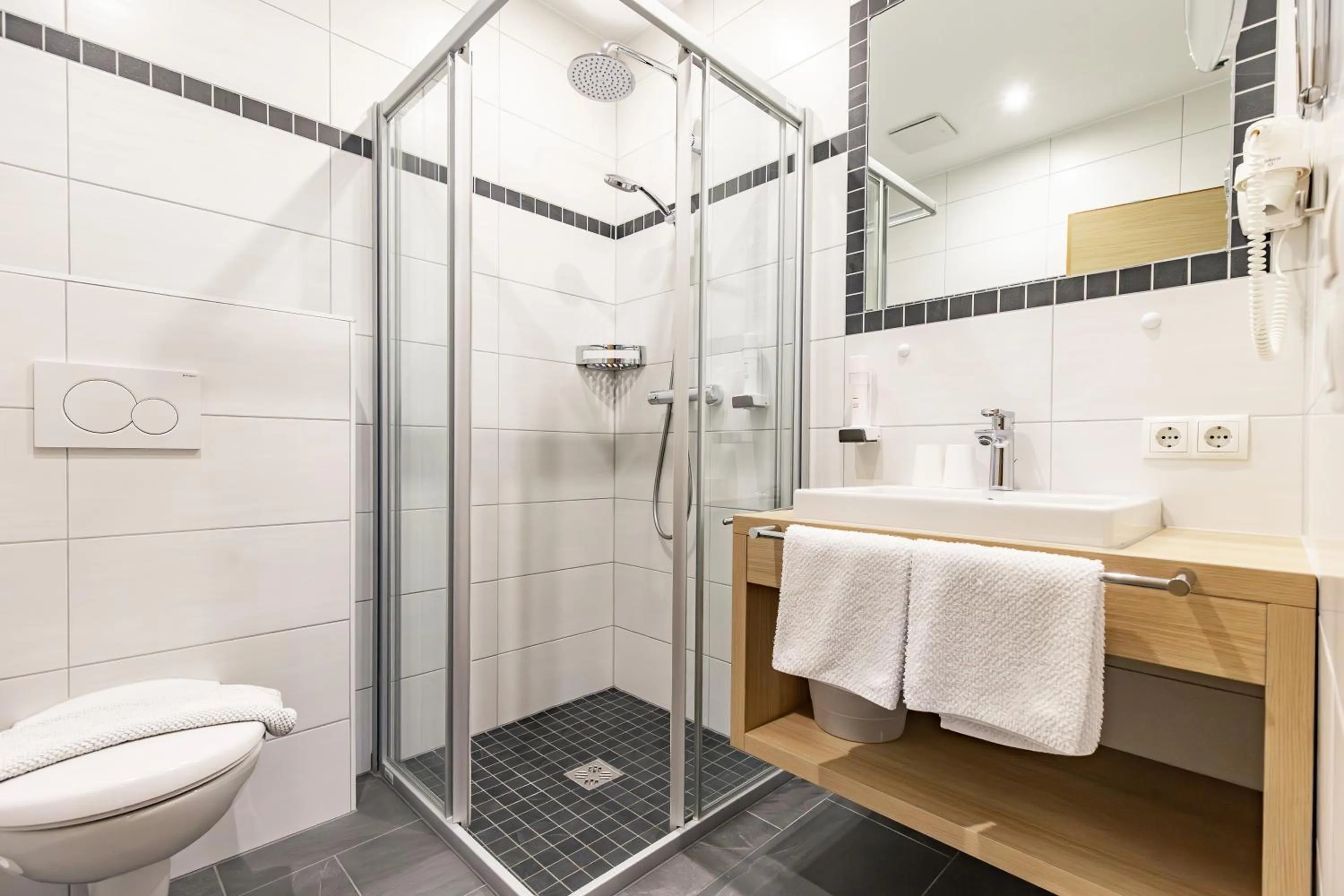 Shower in Das Aparthotel Olympia Tirol