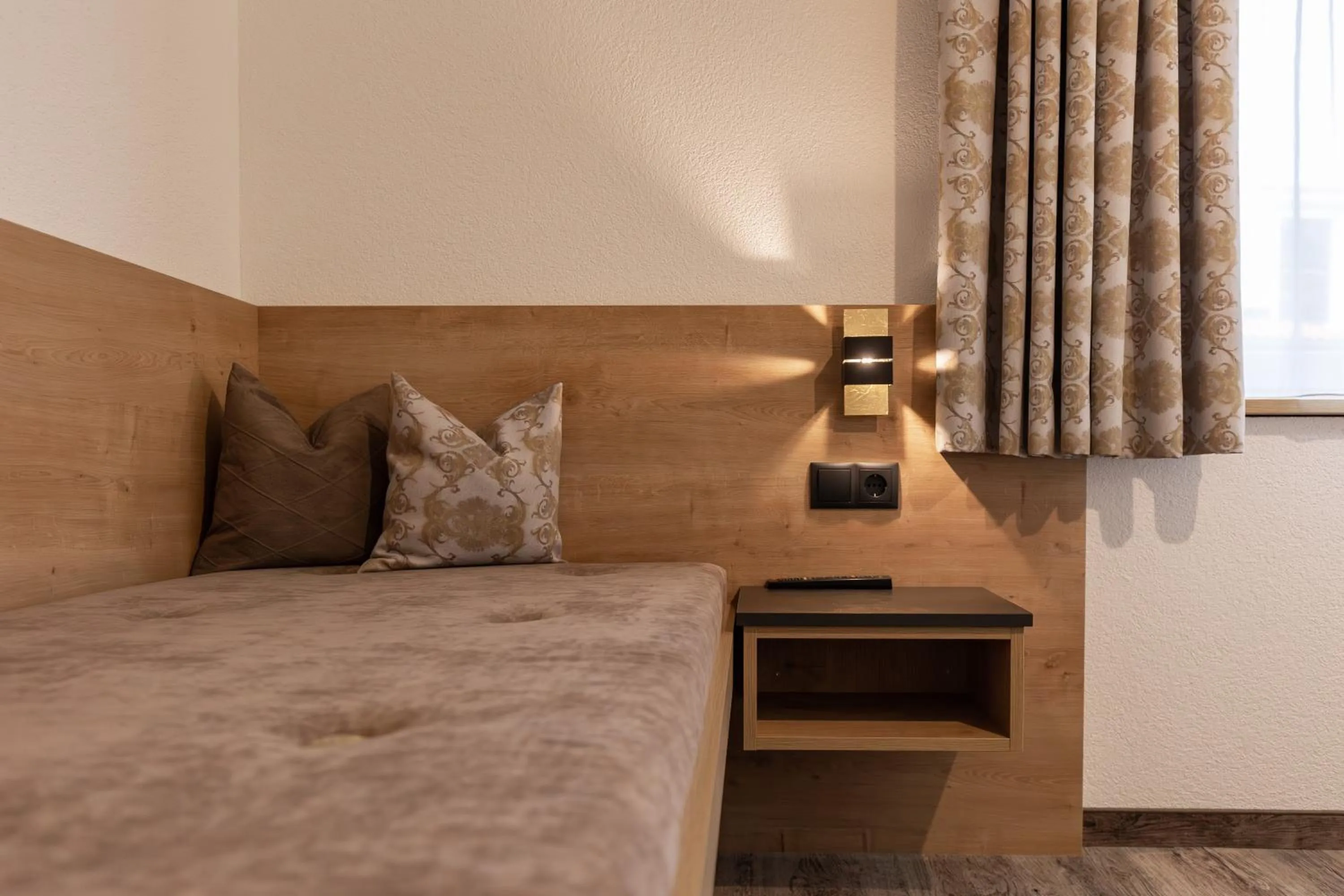 Bed in Das Aparthotel Olympia Tirol