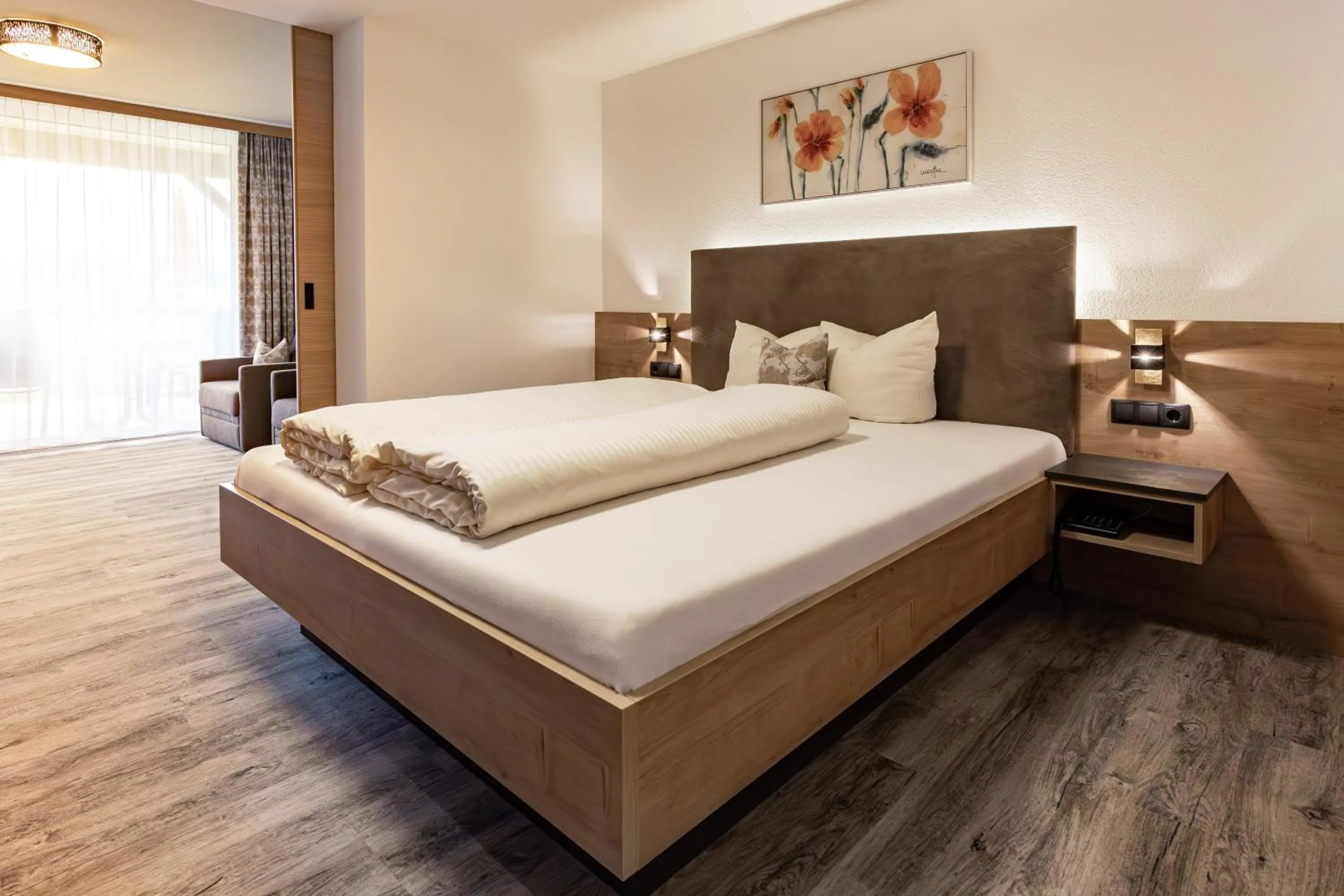 Bed in Das Aparthotel Olympia Tirol