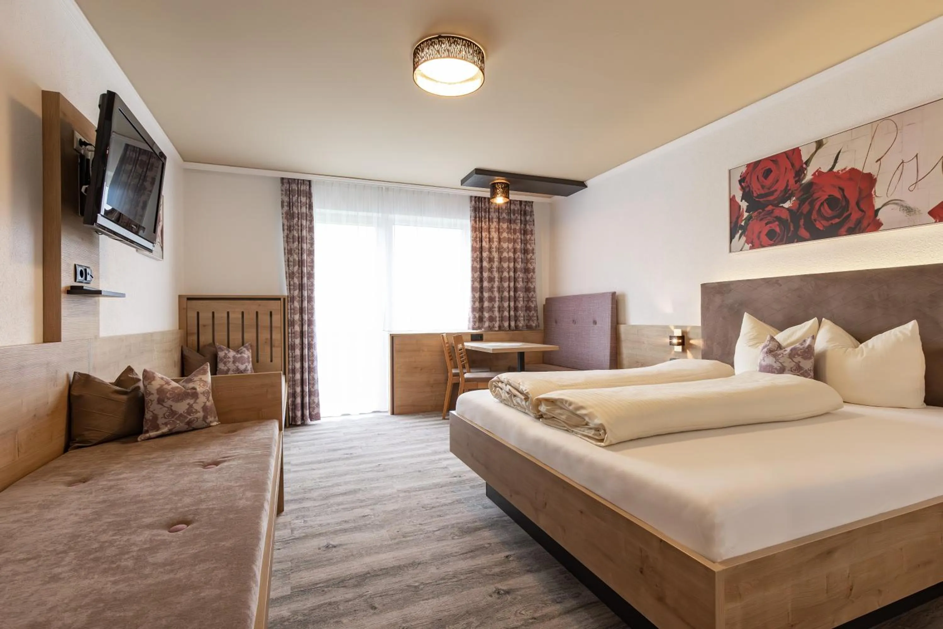 Bed in Das Aparthotel Olympia Tirol