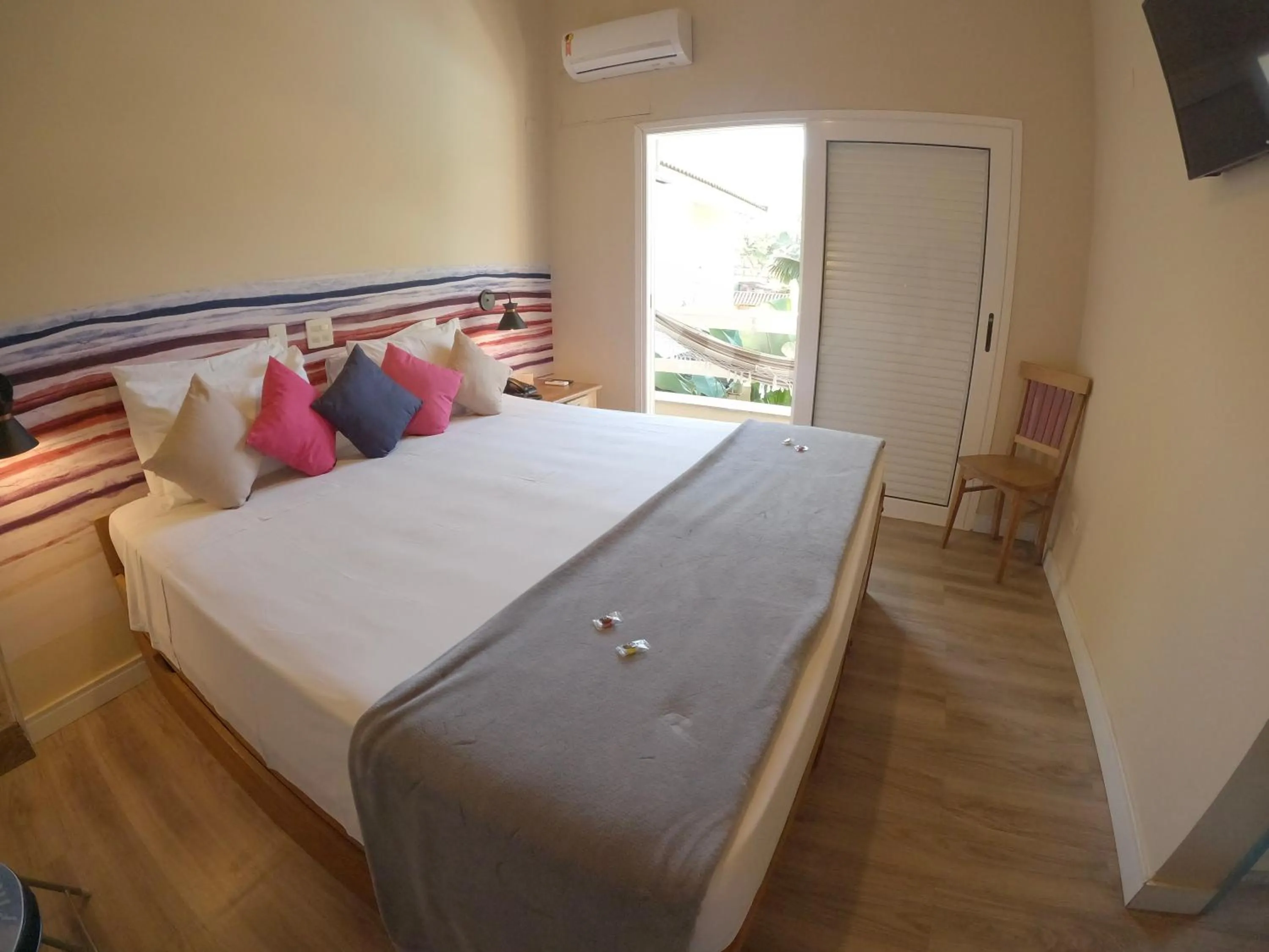 Photo of the whole room, Bed in Pousada Toca da Praia