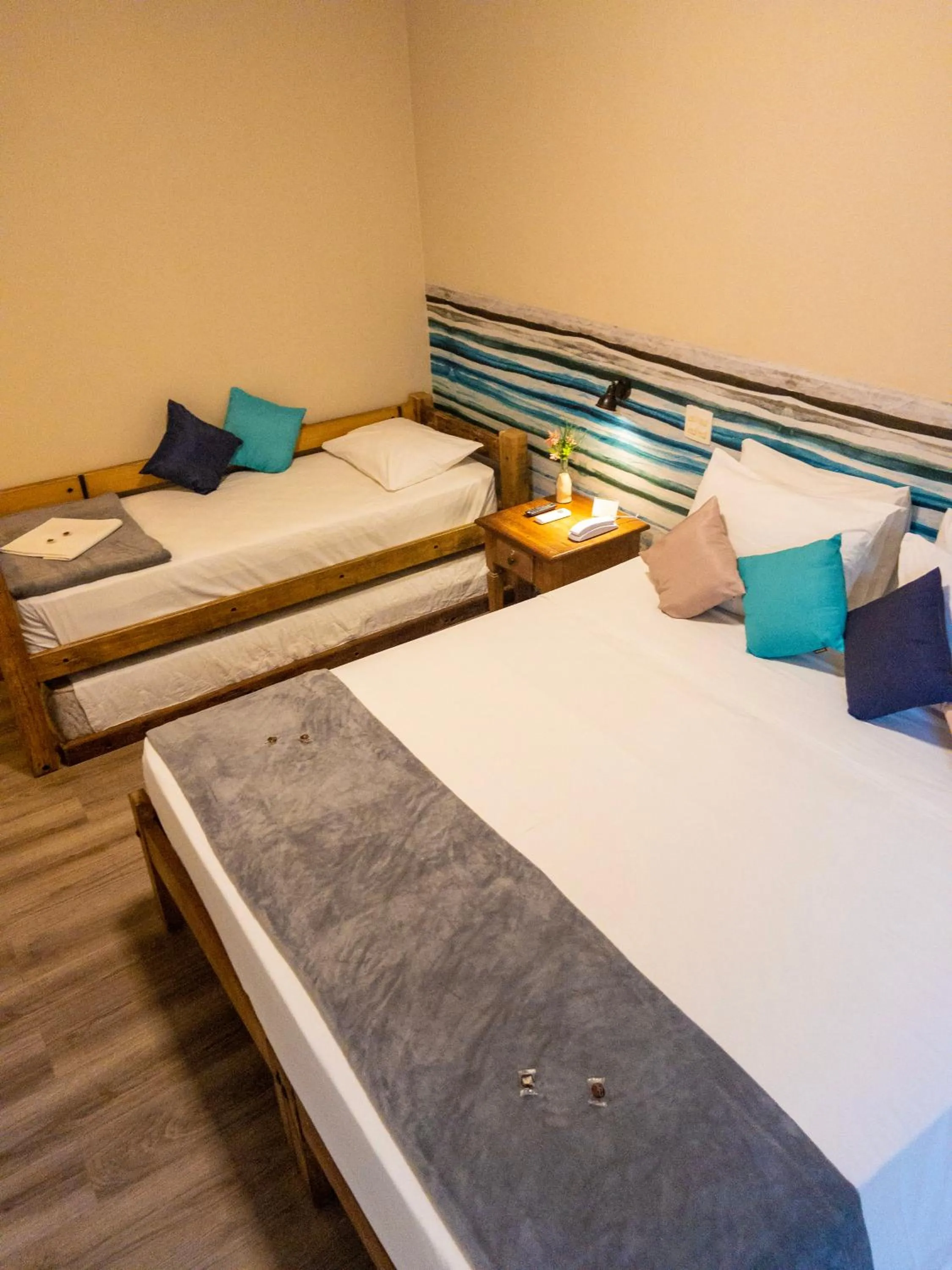 Bed in Pousada Toca da Praia