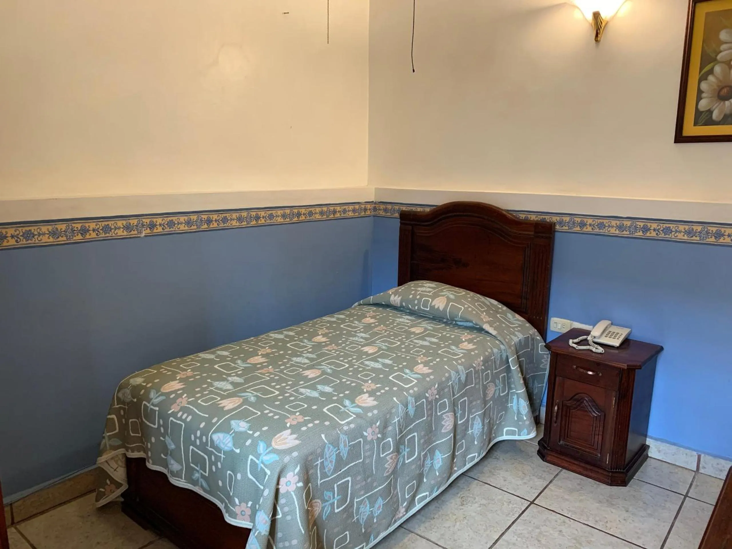 Bedroom in OYO Hotel Real de Cortés