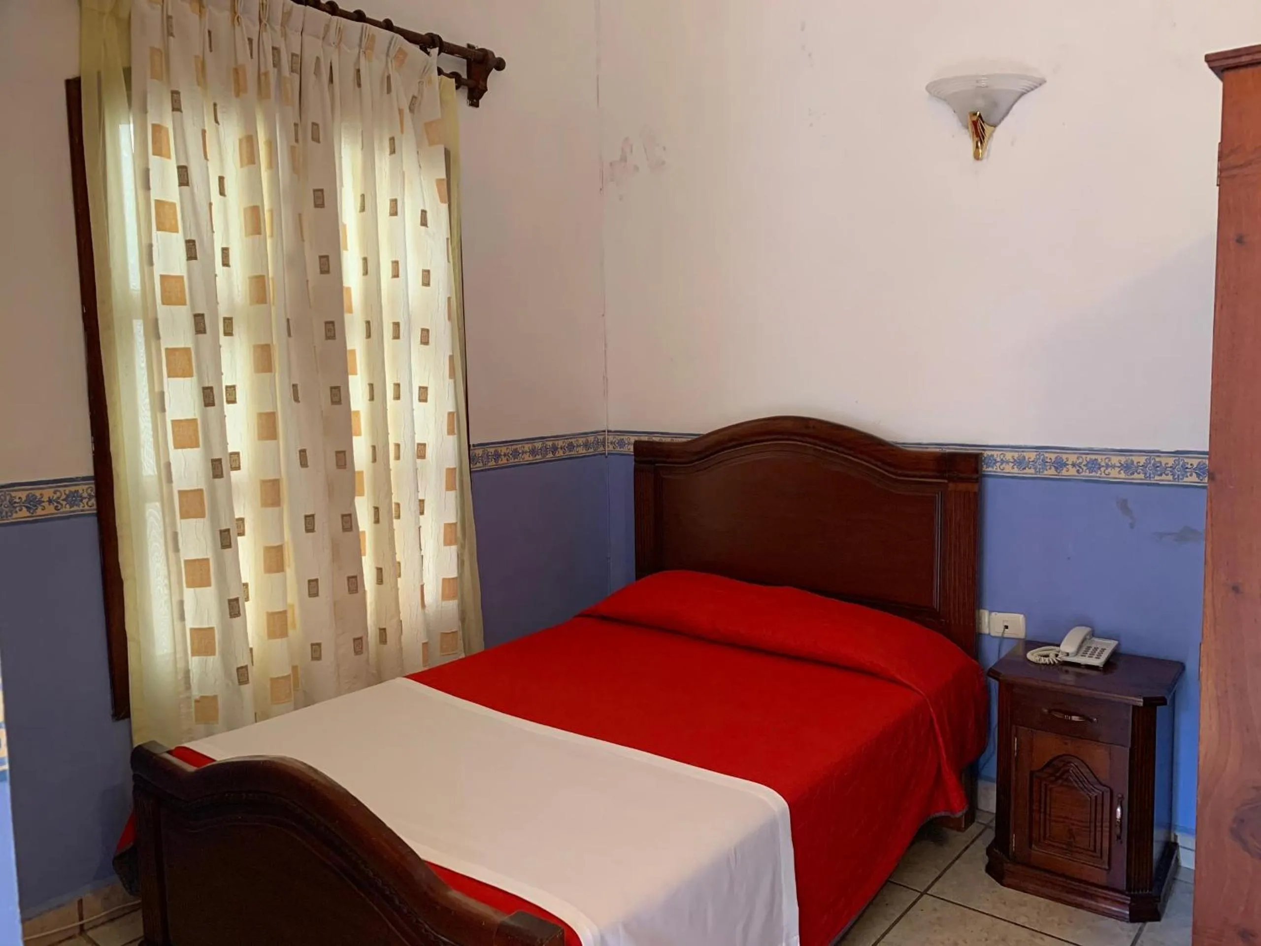 Bedroom in OYO Hotel Real de Cortés